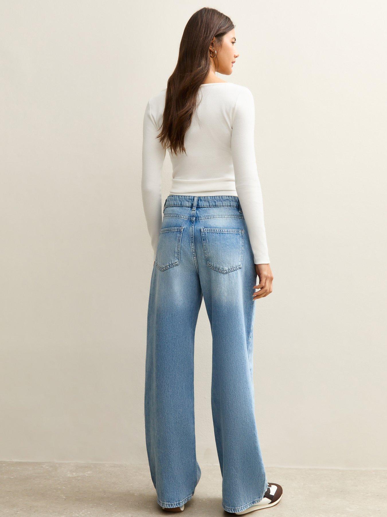 Image 2 of 5 of New Look Mid Blue Low Rise Wide Leg Jeans