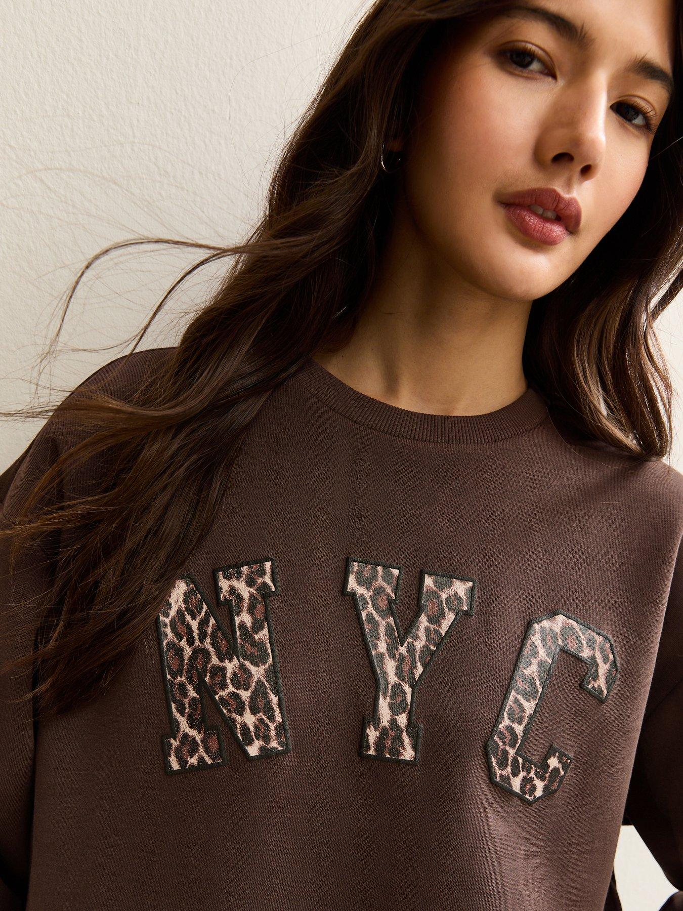 Image 4 of 5 of New Look NYC Leopard Print Logo Sweatshirt - Brown