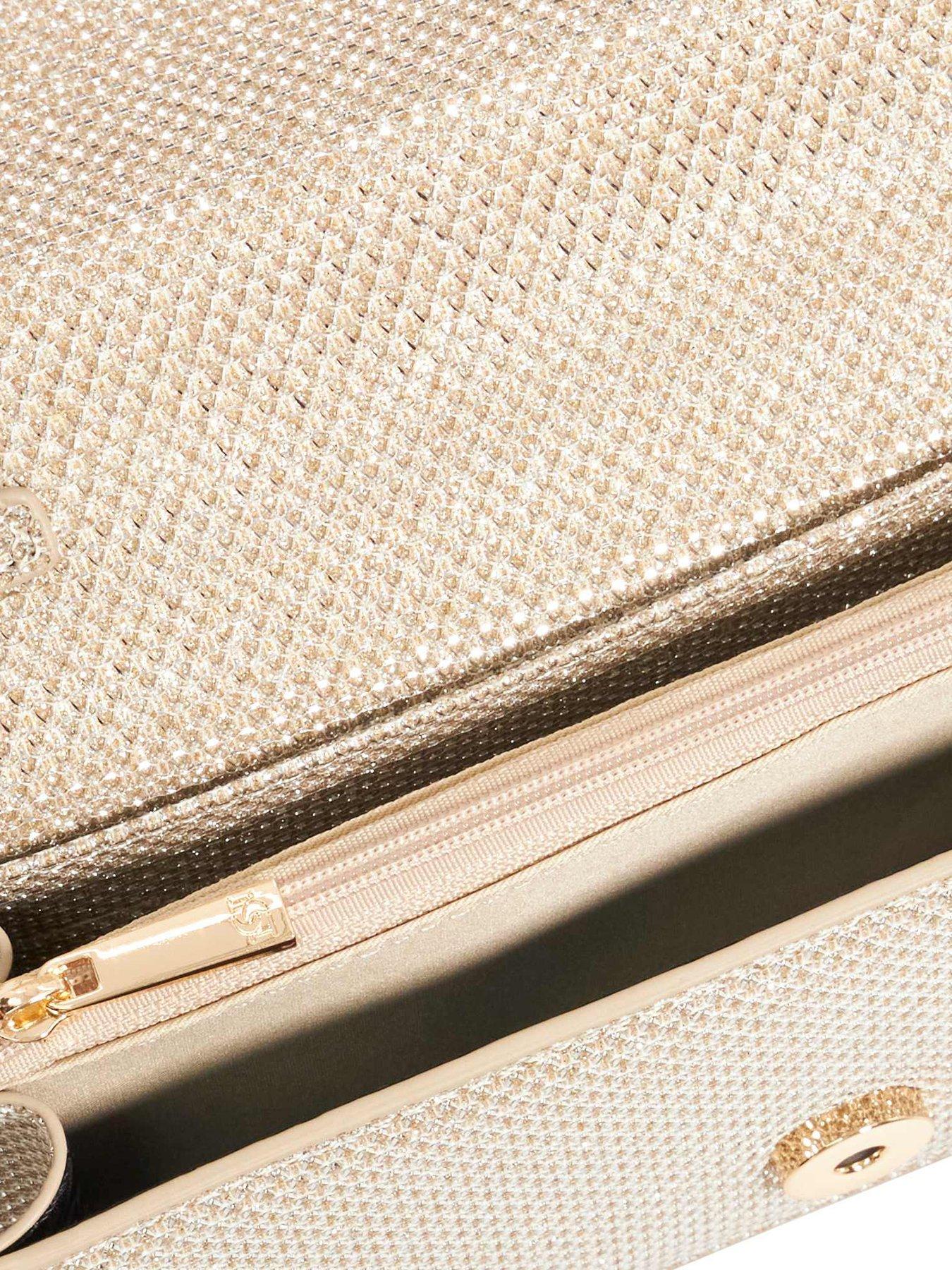  image of dune-london-skilled-top-handle-micro-bag-gold