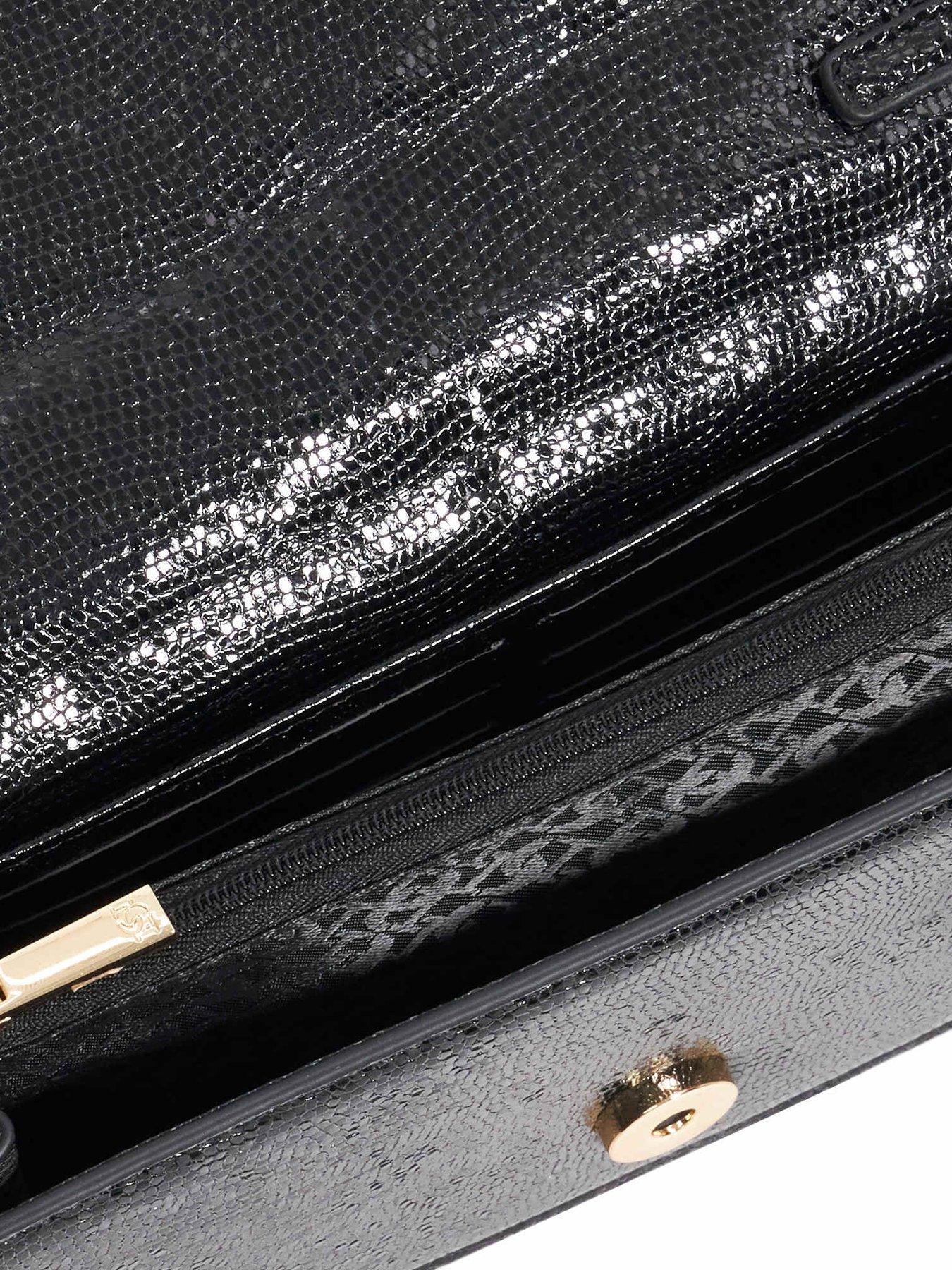  image of dune-london-skilled-top-handle-microbag-black