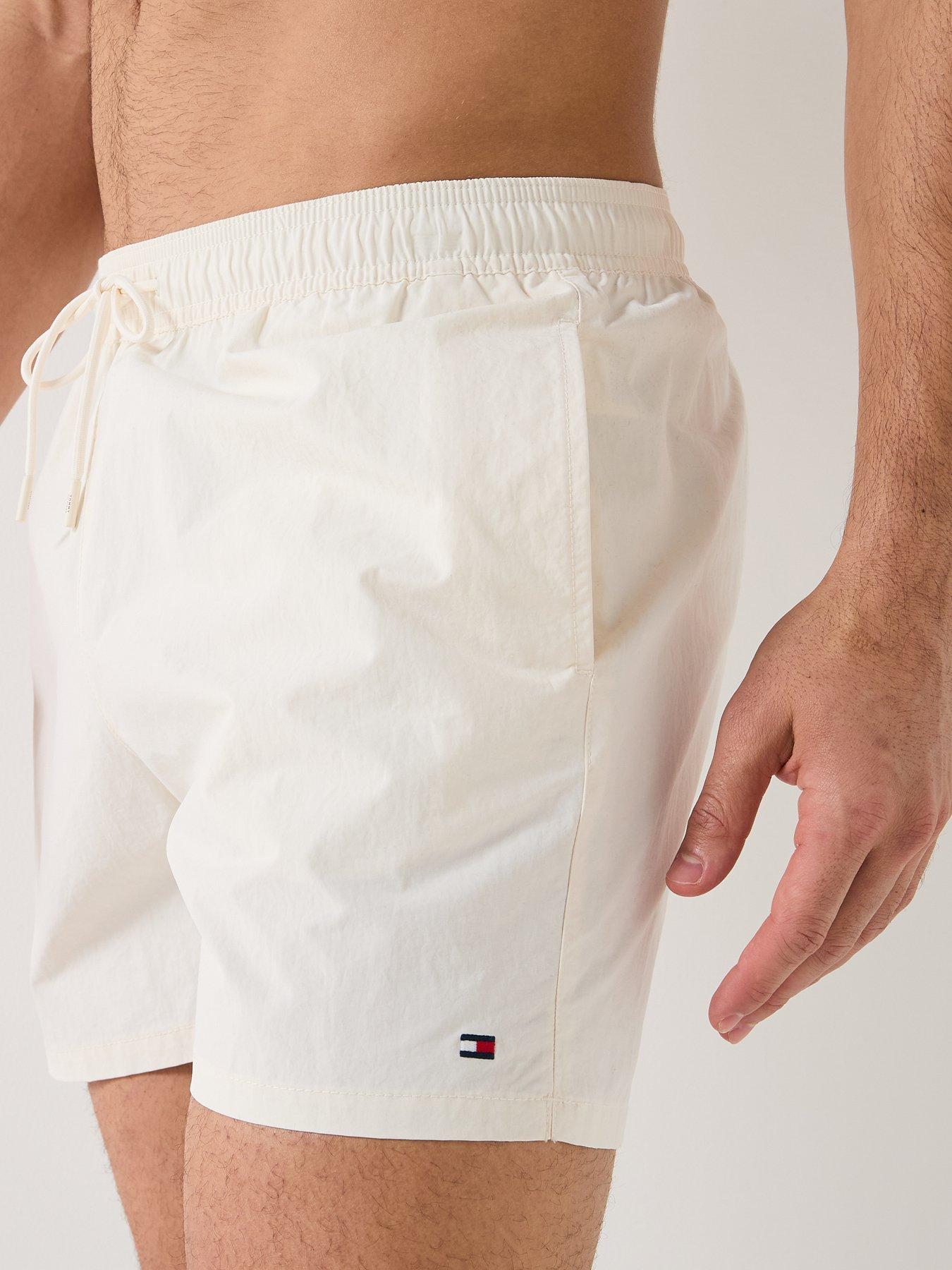  image of tommy-hilfiger-essential-small-flag-medium-swim-shorts-white