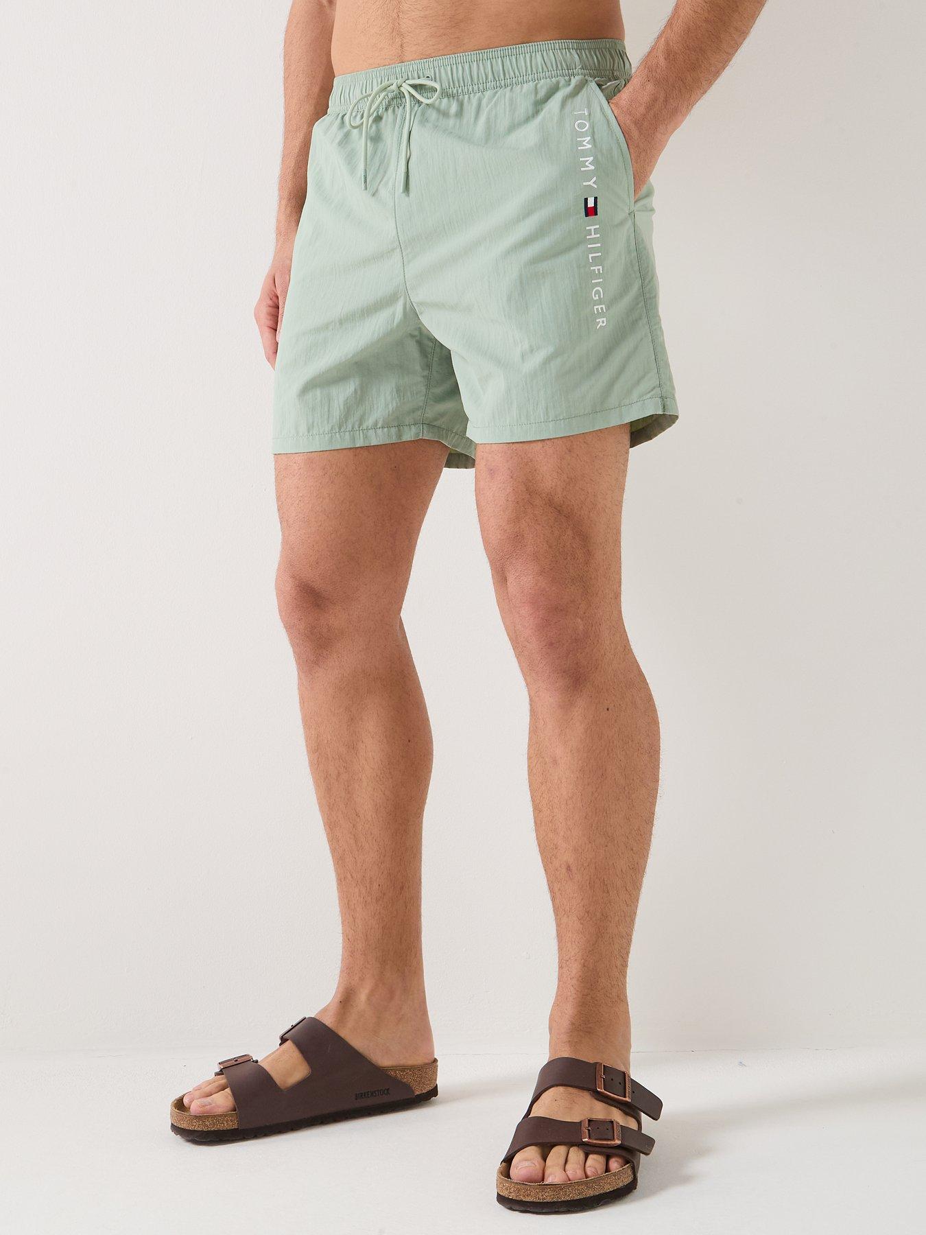 front image of tommy-hilfiger-side-linear-logo-swimshorts-light-green