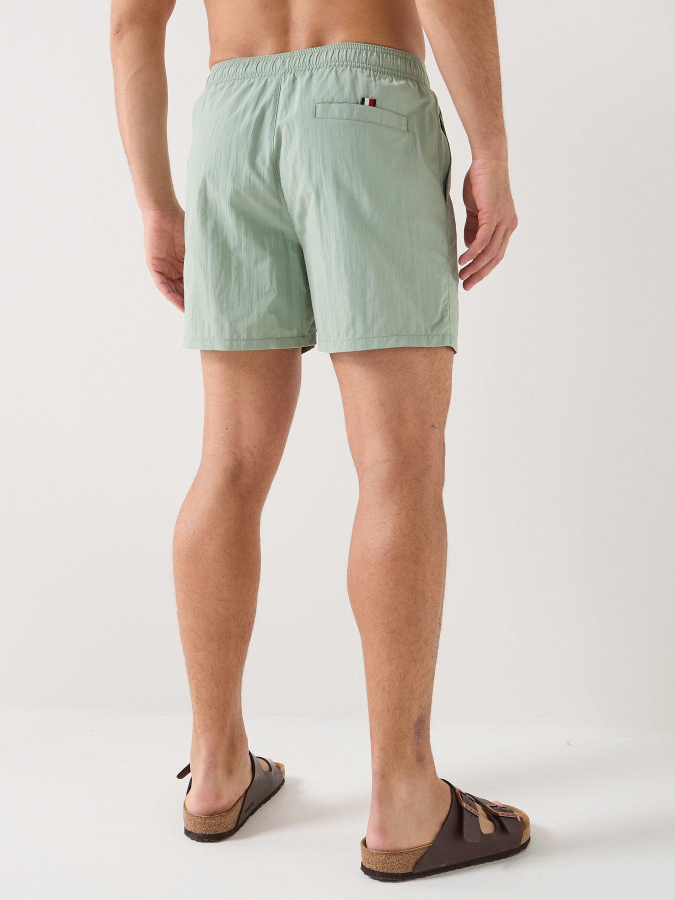  image of tommy-hilfiger-side-linear-logo-swimshorts-light-green