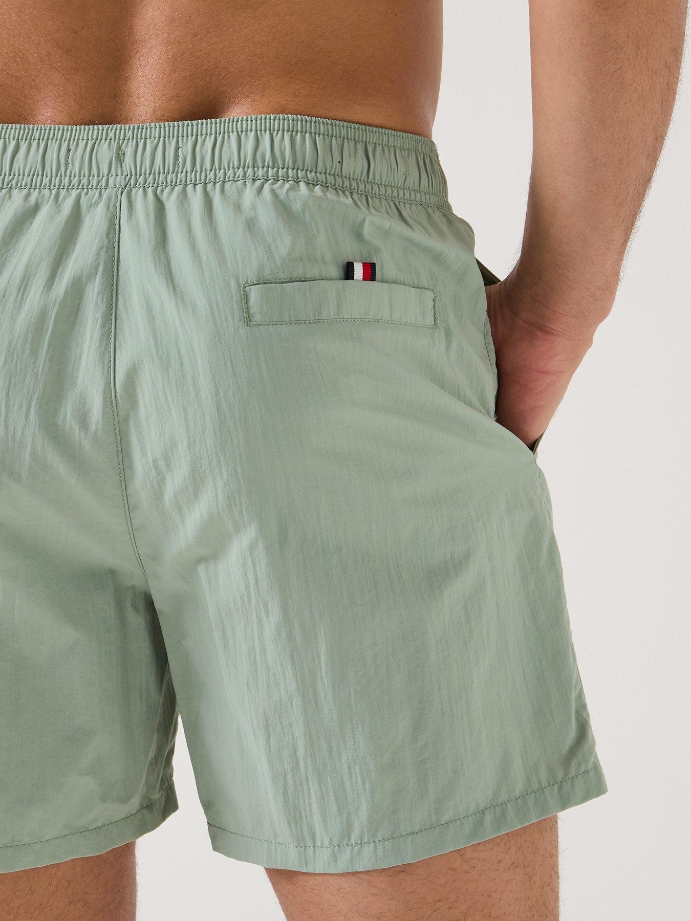  image of tommy-hilfiger-side-linear-logo-swimshorts-light-green