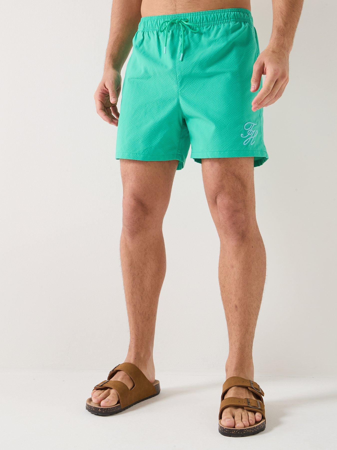 Image 1 of 6 of Tommy Hilfiger Mono Script Ithaca Medium Swim Shorts - Light Green