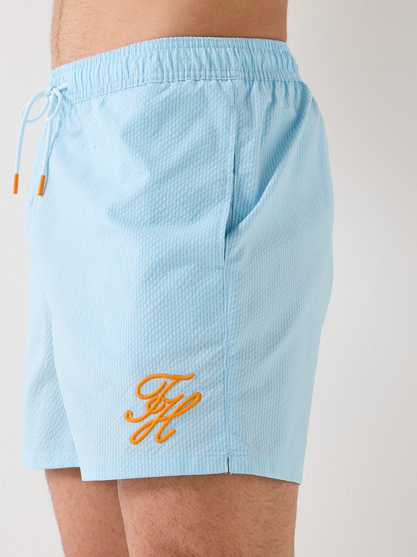 Image 4 of 6 of Tommy Hilfiger Mono Script Ithaca Medium Swim Shorts - Blue