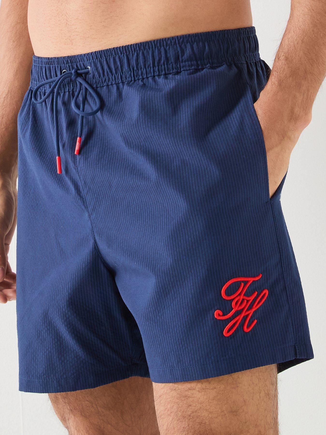 Image 4 of 6 of Tommy Hilfiger Mono Script Ithaca Medium Swim Shorts - Navy
