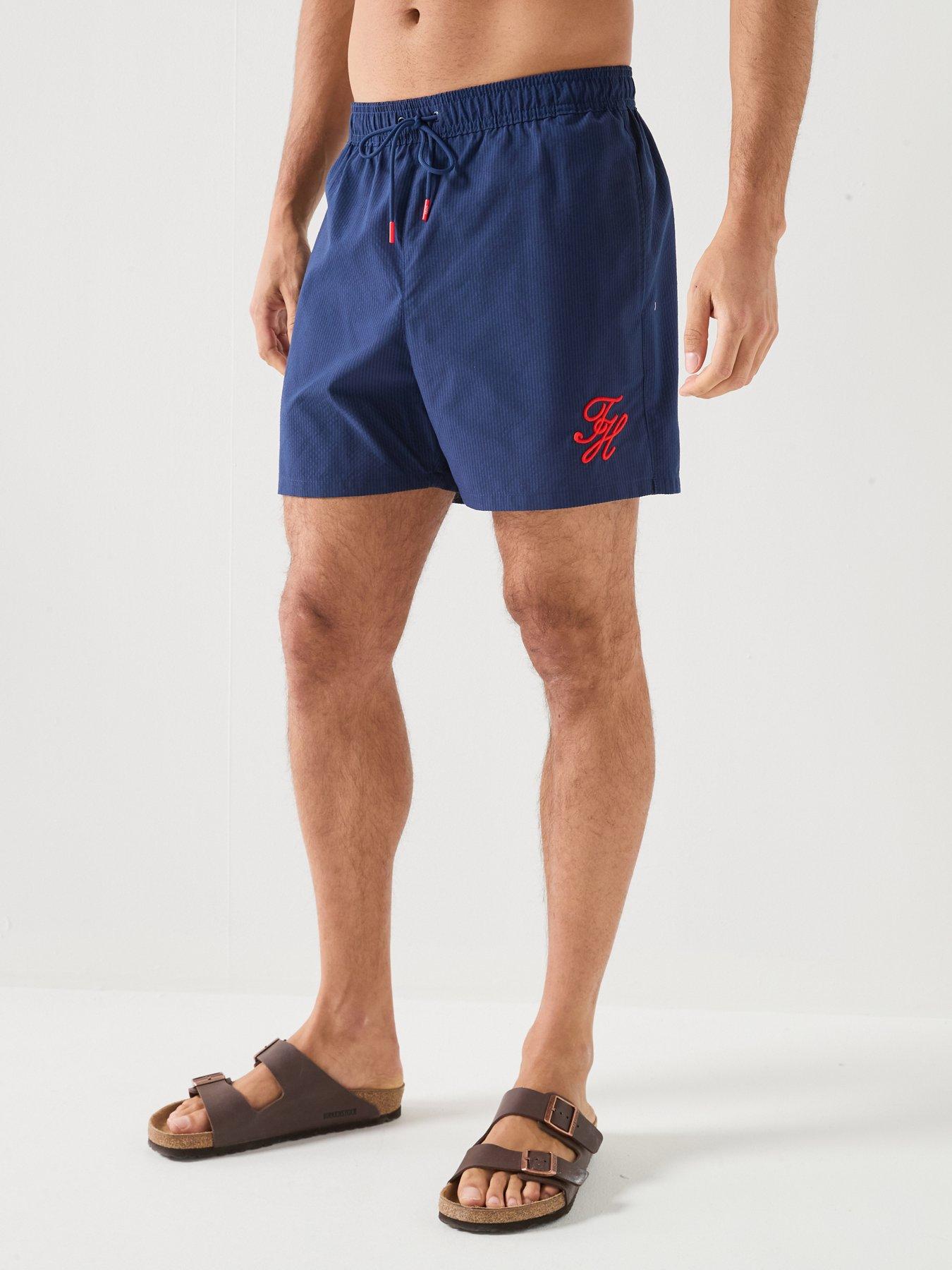 Image 5 of 6 of Tommy Hilfiger Mono Script Ithaca Medium Swim Shorts - Navy