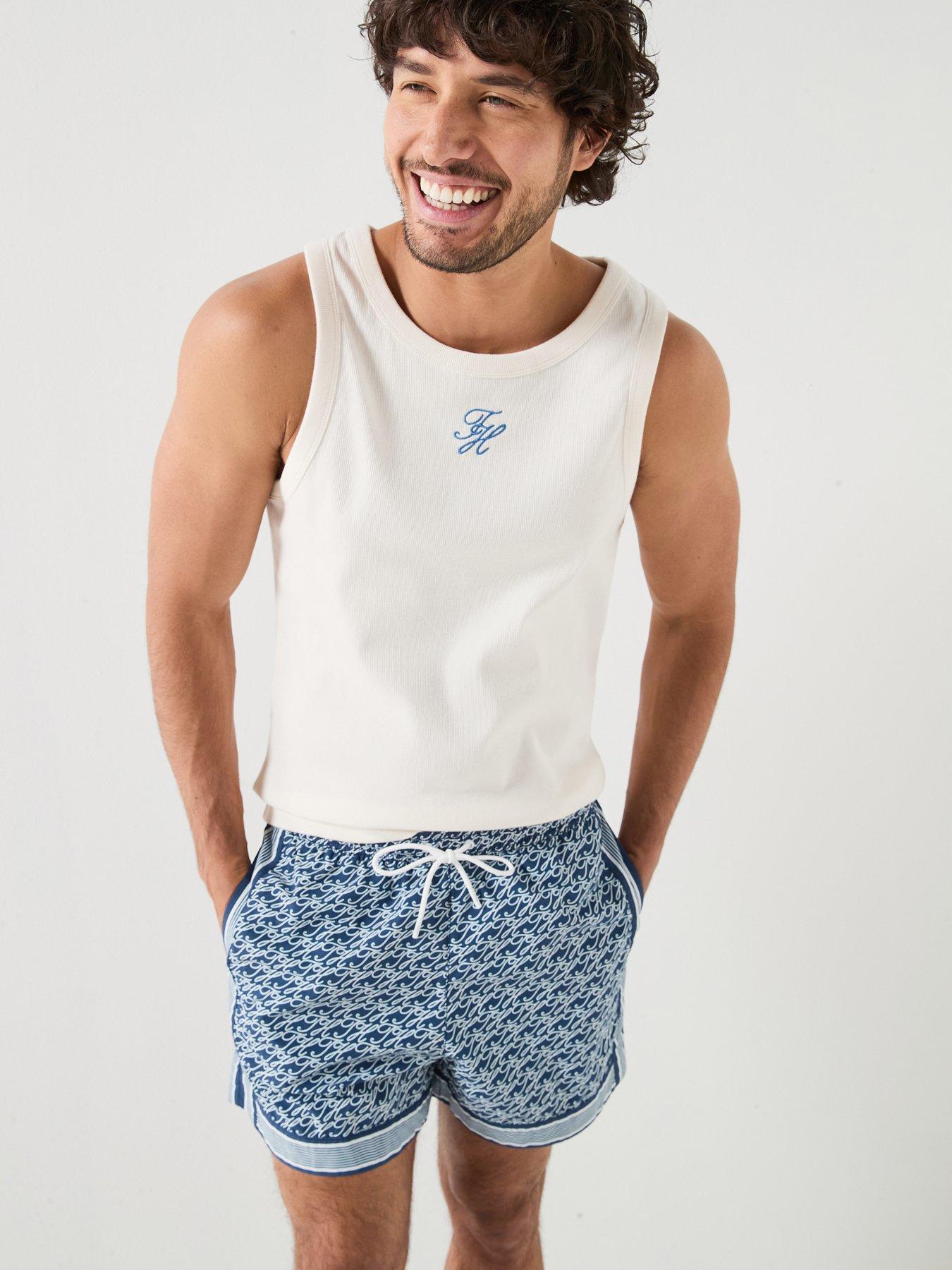 Image 1 of 6 of Tommy Hilfiger Mono Script Logo Rib Vest - Off White