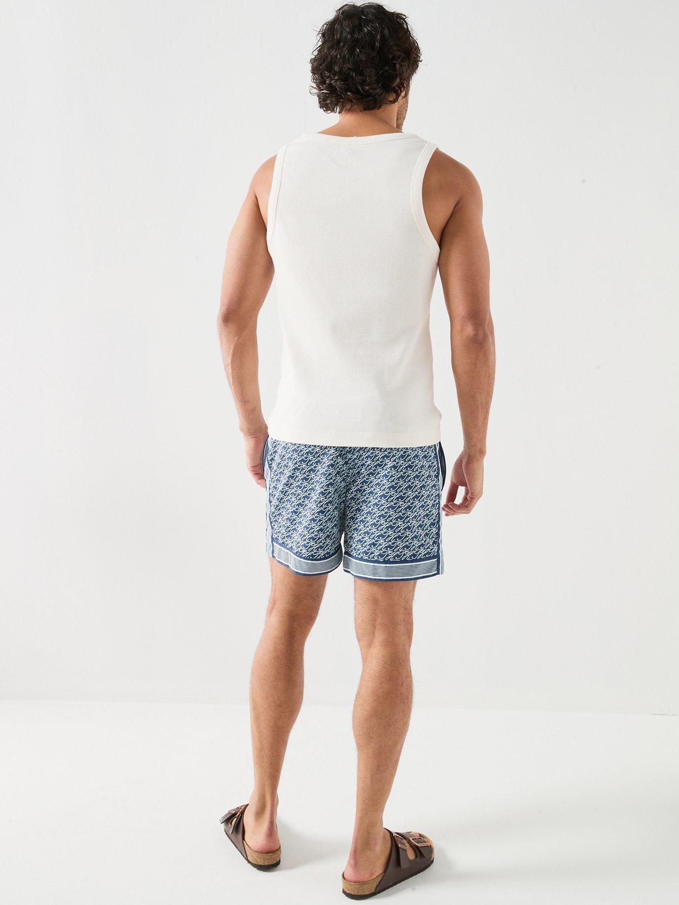 Image 2 of 6 of Tommy Hilfiger Mono Script Logo Rib Vest - Off White