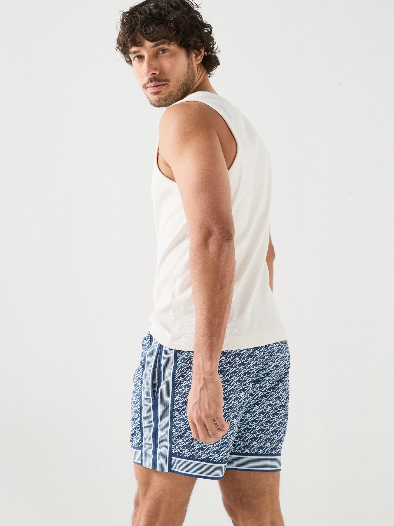 Image 6 of 6 of Tommy Hilfiger Mono Script Logo Rib Vest - Off White