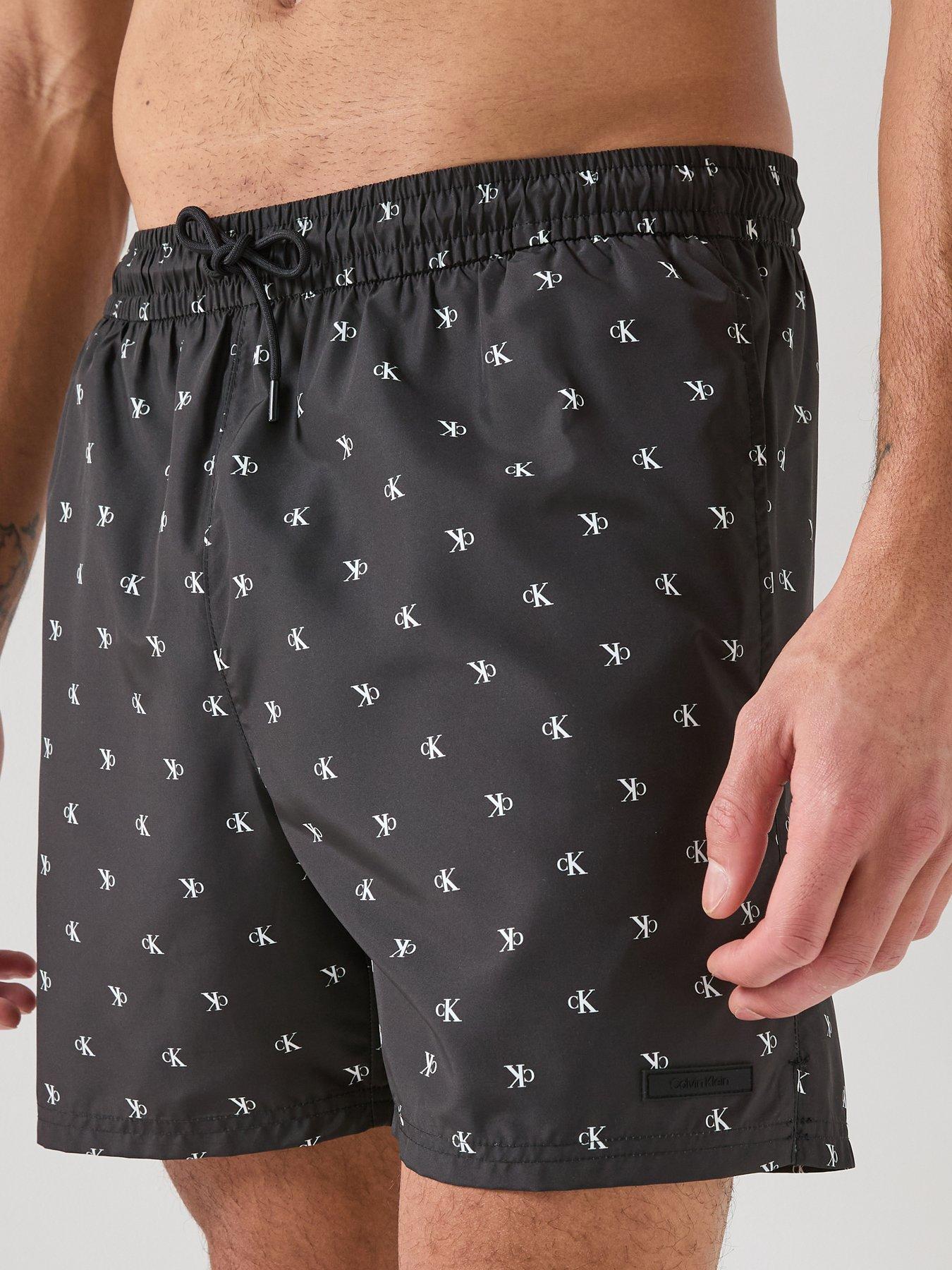 Image 5 of 6 of Calvin Klein Essenital All Over Logo Medium Swim Shorts - Black