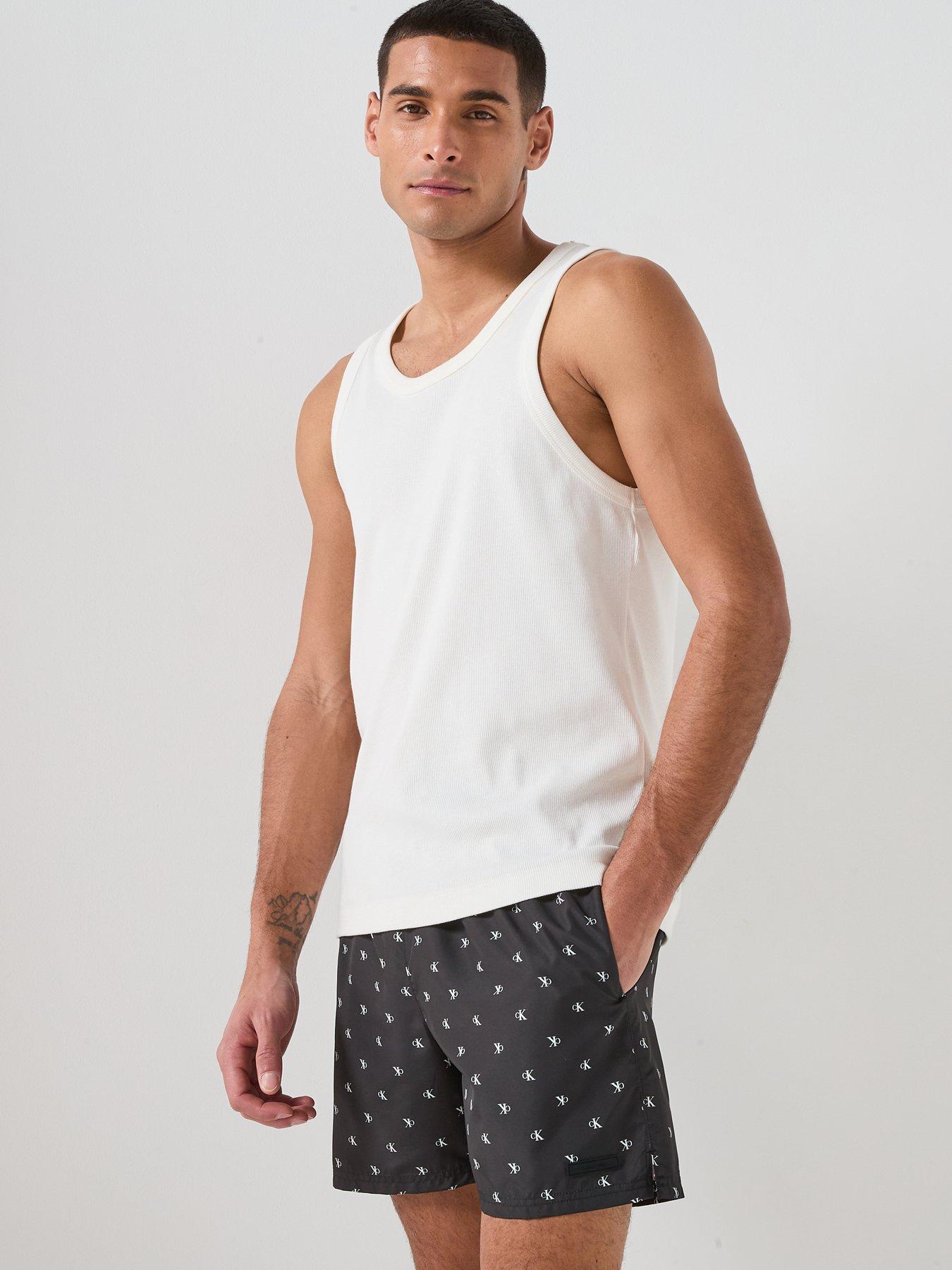 Image 6 of 6 of Calvin Klein Essenital All Over Logo Medium Swim Shorts - Black