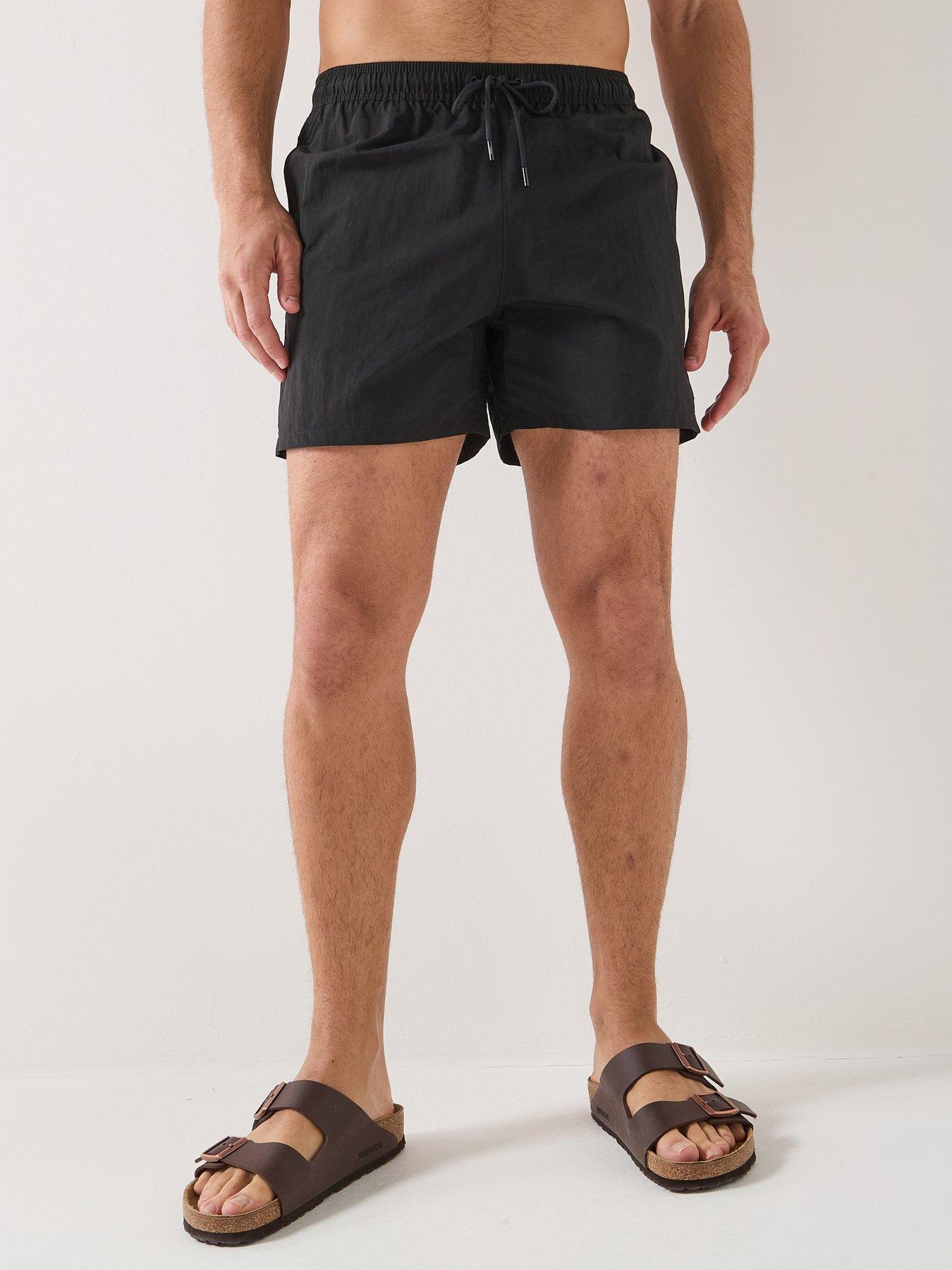 Image 1 of 6 of Tommy Hilfiger Essential Medium Swim Shorts - Black