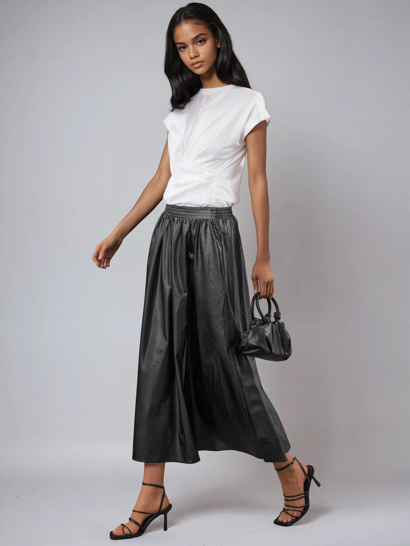  image of religion-sophie-full-maxi-skirt-in-black-faux-leather-with-pockets