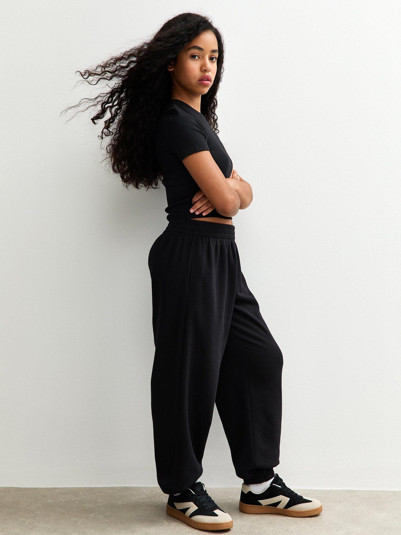 front image of new-look-915-girls-oversized-cuff-joggers-balck