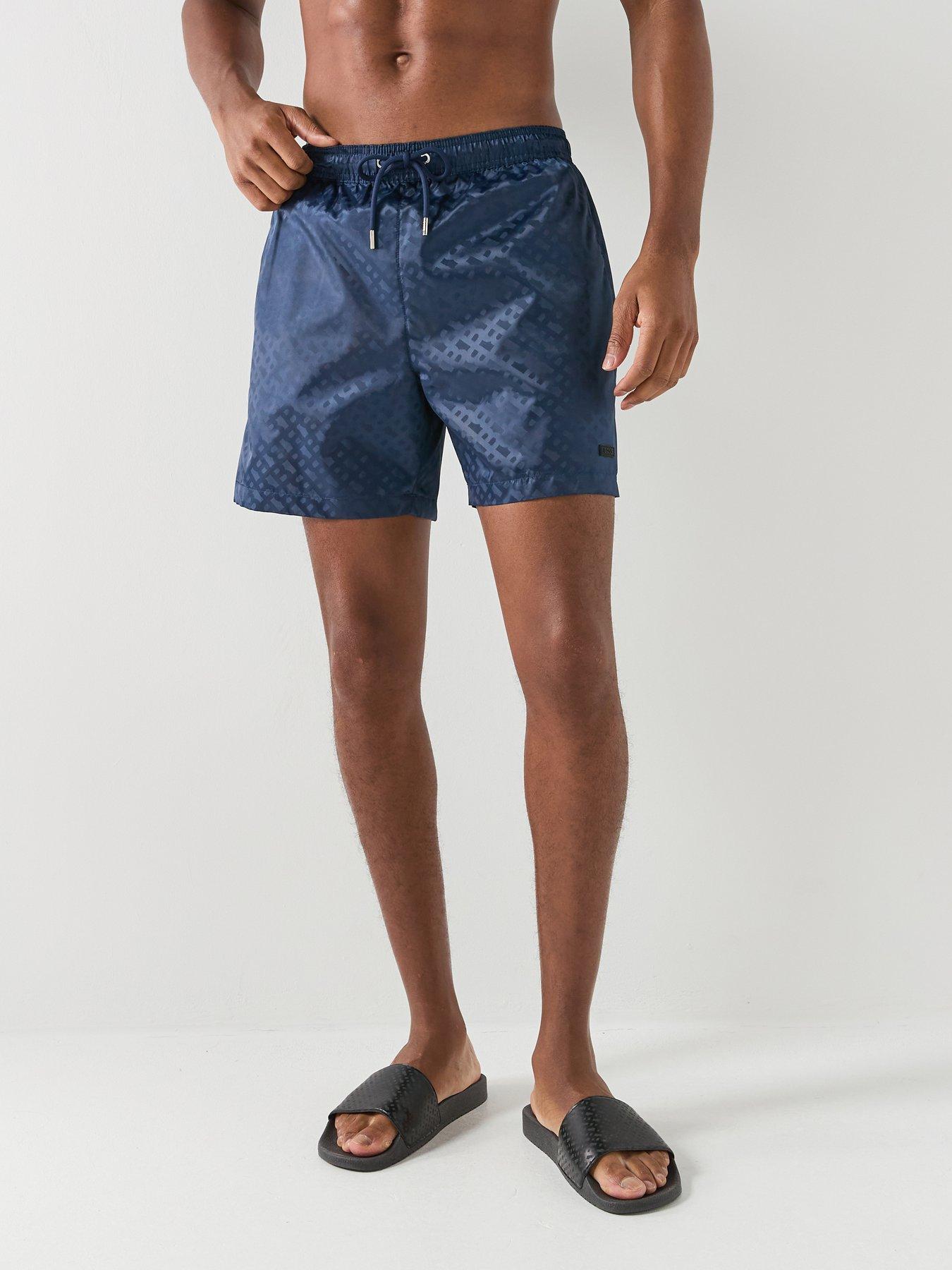 front image of boss-jacques-jacquard-monogram-swim-shorts-navy