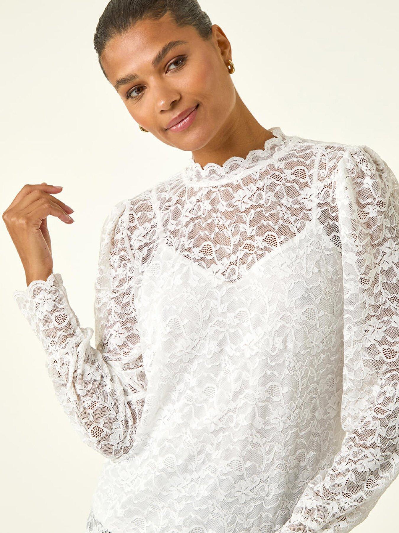  image of roman-lace-frill-high-neck-stretch-top-ivory