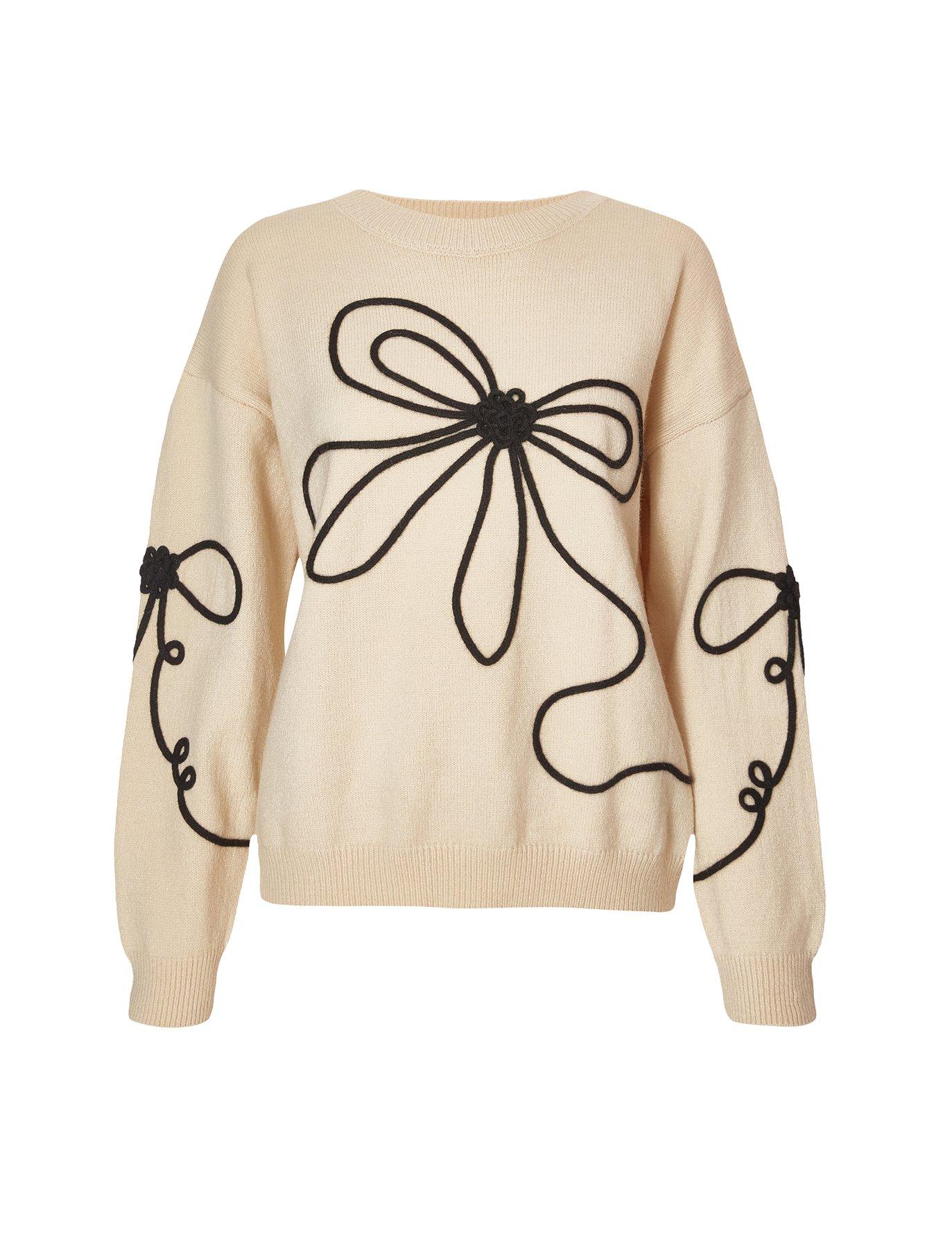  image of quiz-stone-stitch-bow-jumper