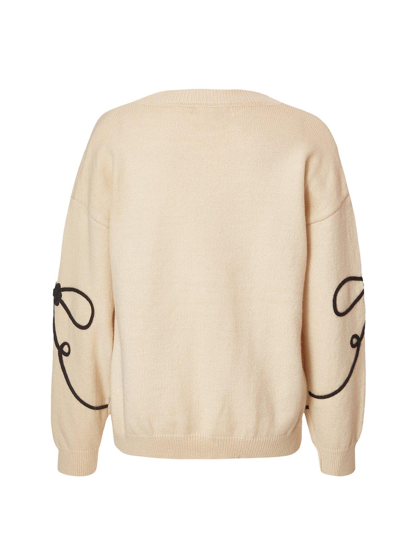  image of quiz-stone-stitch-bow-jumper