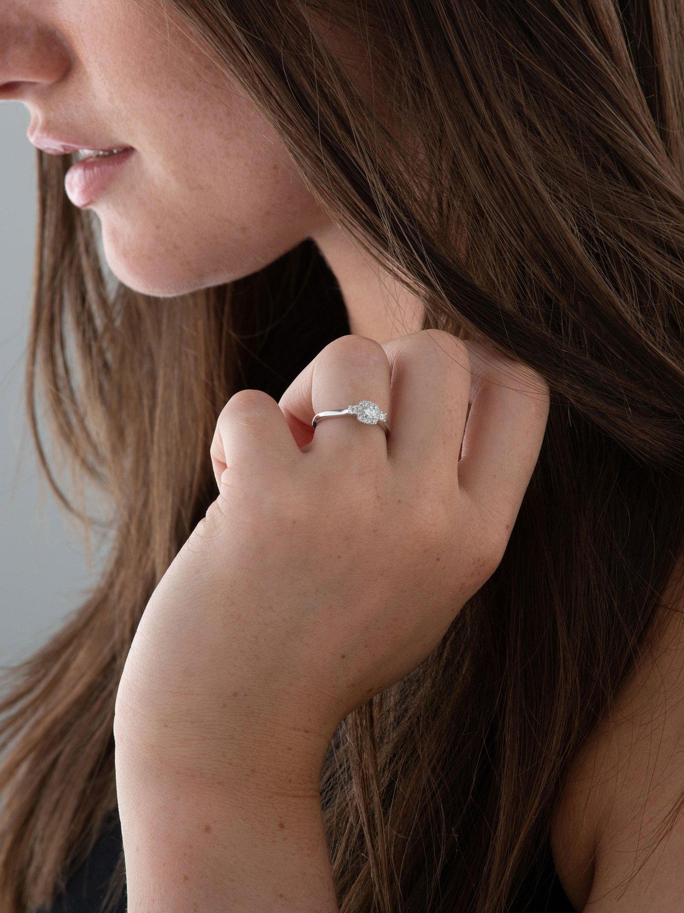  image of beaverbrooks-9ct-white-gold-diamond-halo-ring