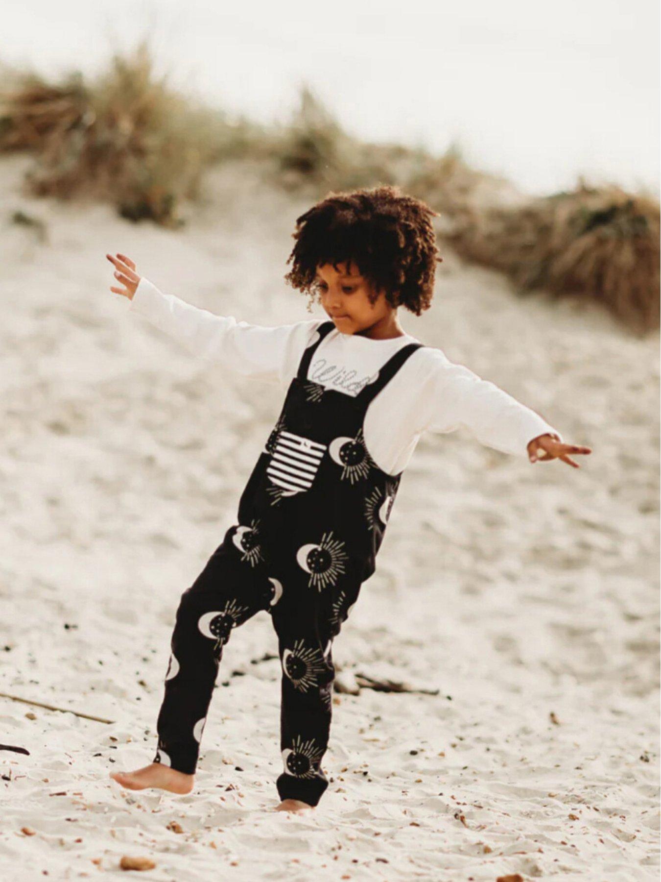 Image 1 of 5 of Turtledove London Kids Cotton Celestial Print Dungarees - Black