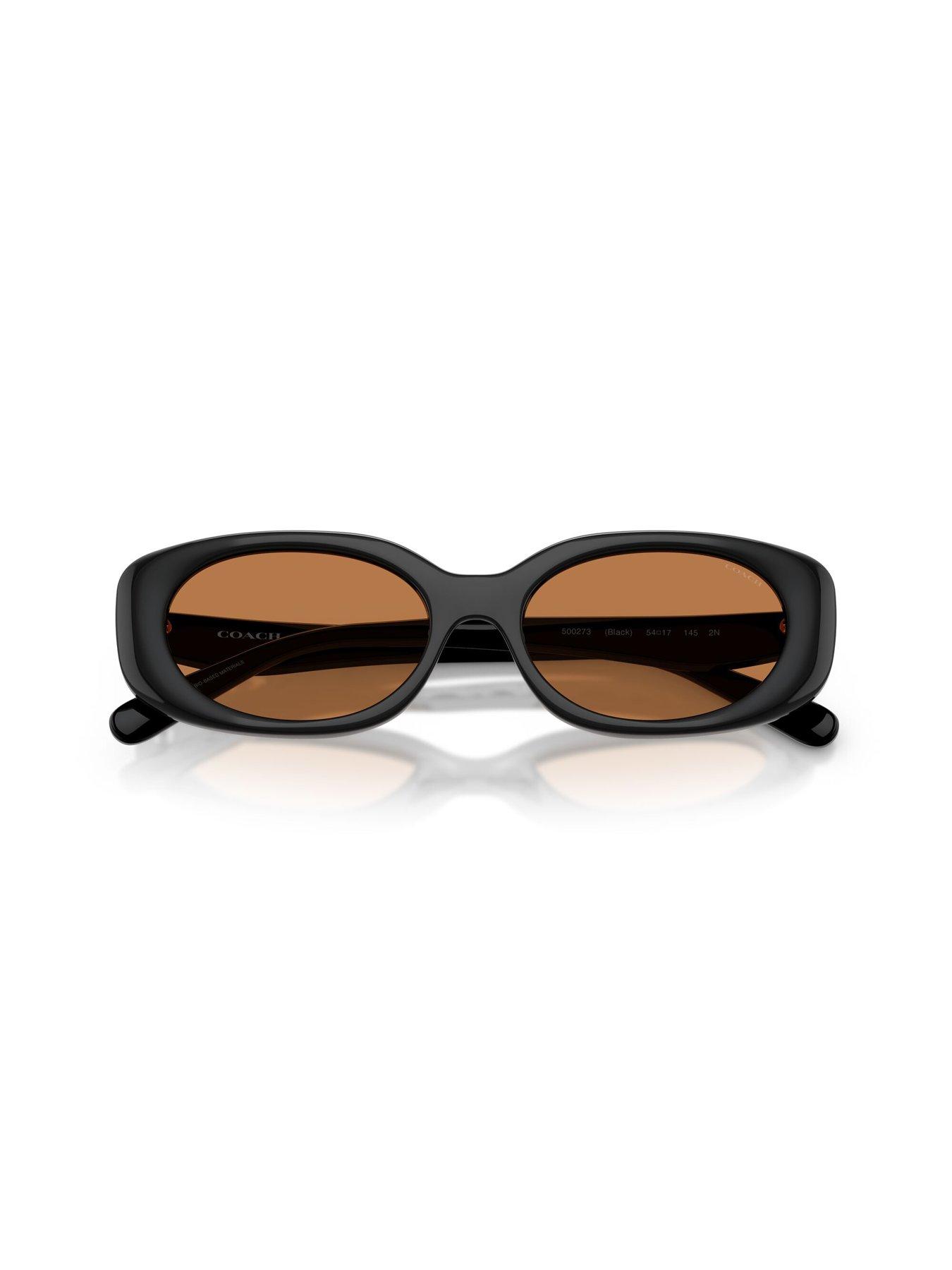  image of coach-oval-sunglasses--black-with-amber-lens