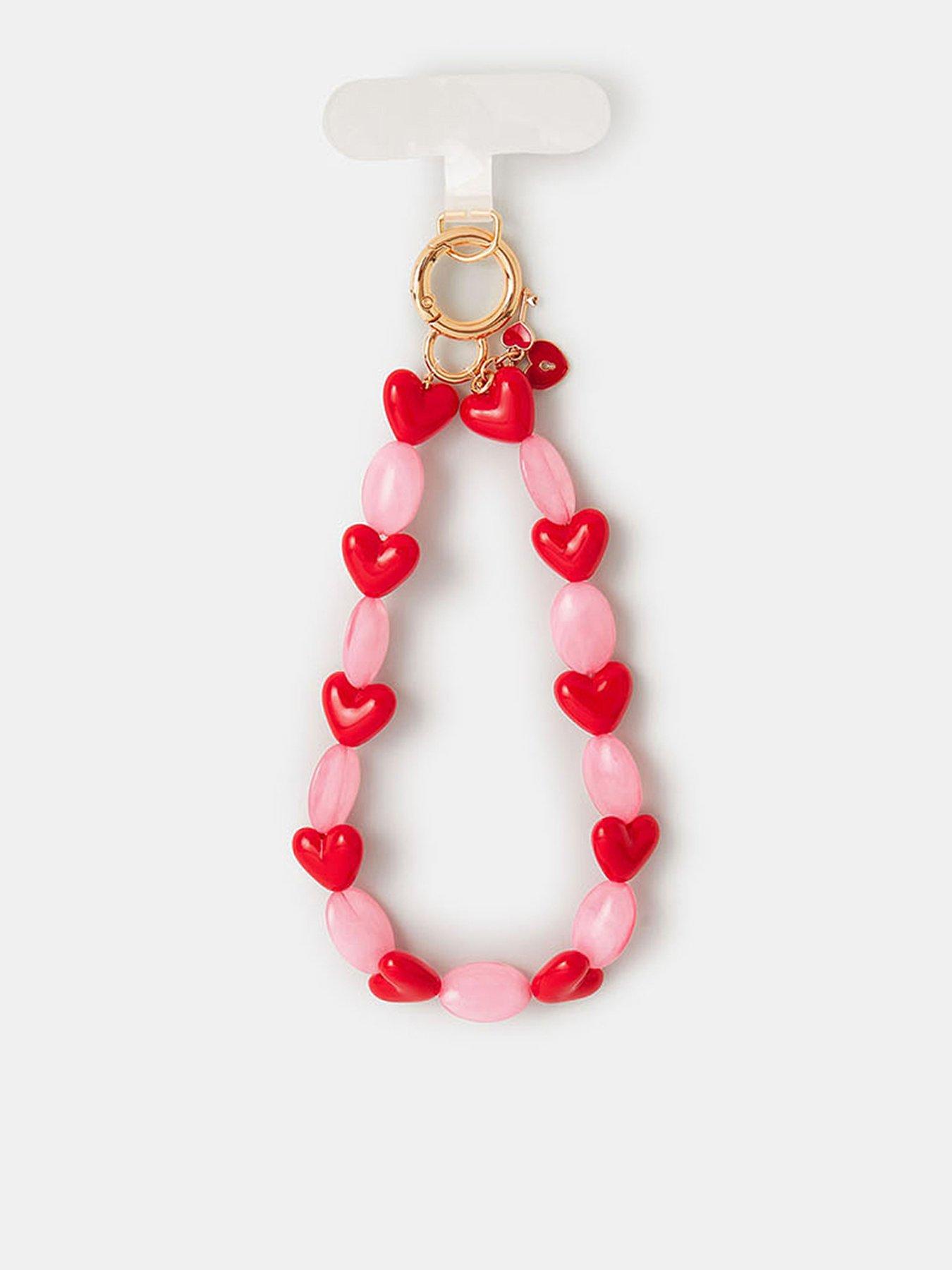 Image 1 of 3 of Accessorize Heart Bead Phone Wrist Strap