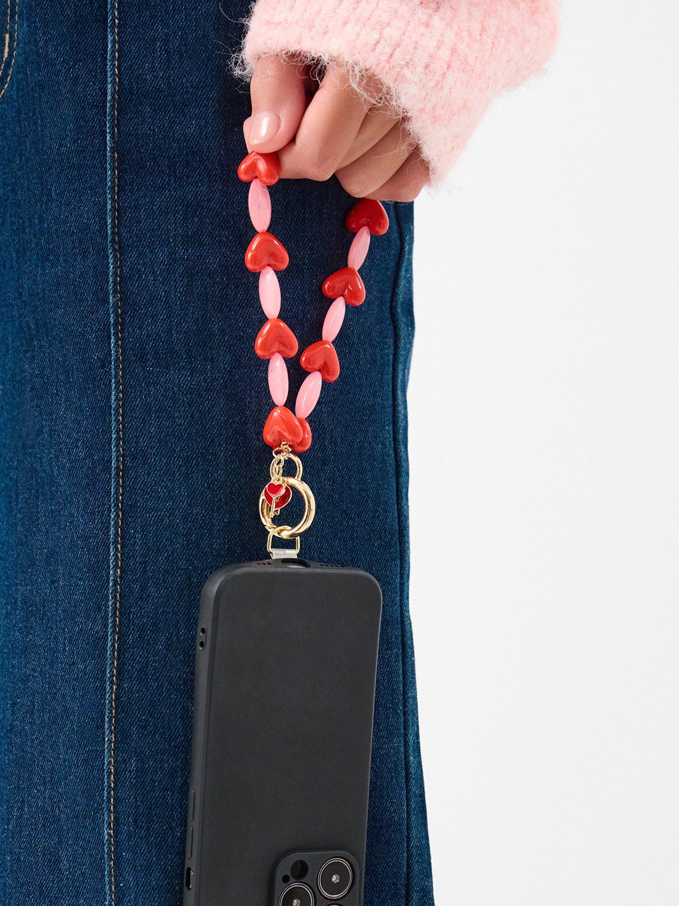 Image 2 of 3 of Accessorize Heart Bead Phone Wrist Strap