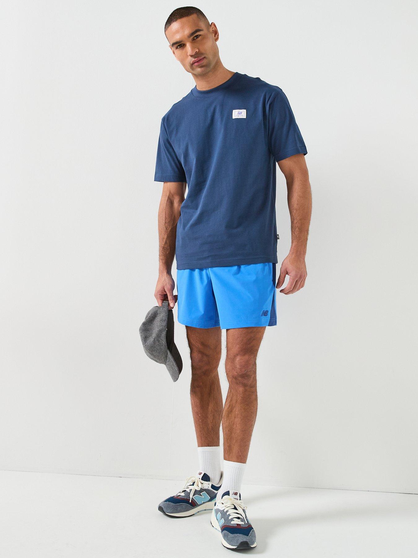  image of new-balance-mens-woven-label-t-shirt-blue