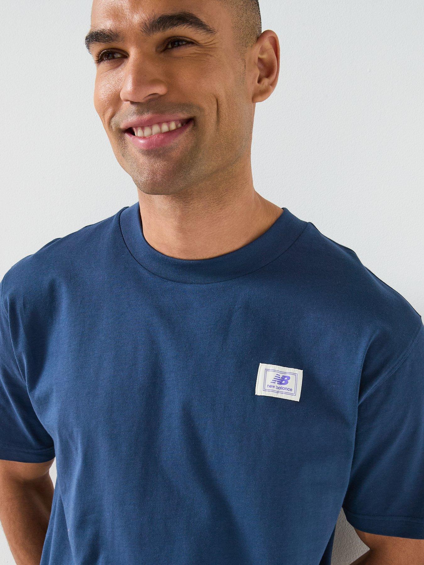  image of new-balance-mens-woven-label-t-shirt-blue