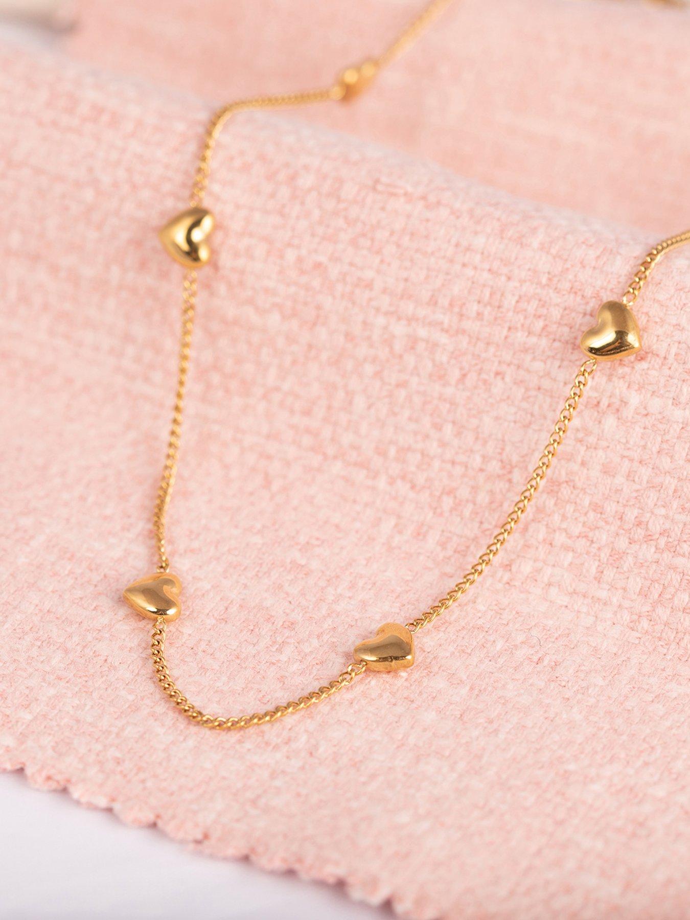  image of the-love-collection-gold-plated-stainless-steel-multi-heart-necklace