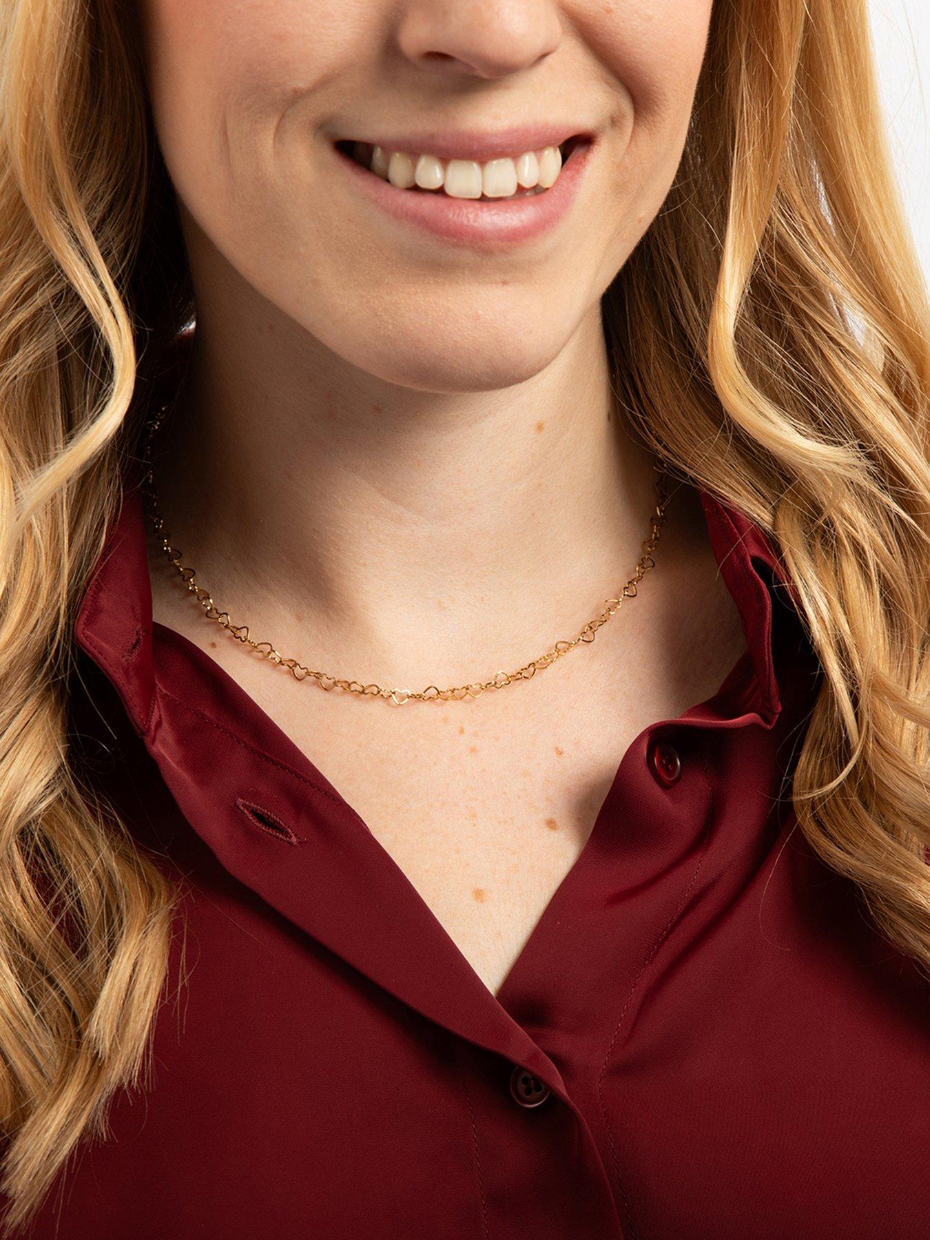 stillFront image of the-love-collection-gold-plated-stainless-steel-linked-heart-necklace