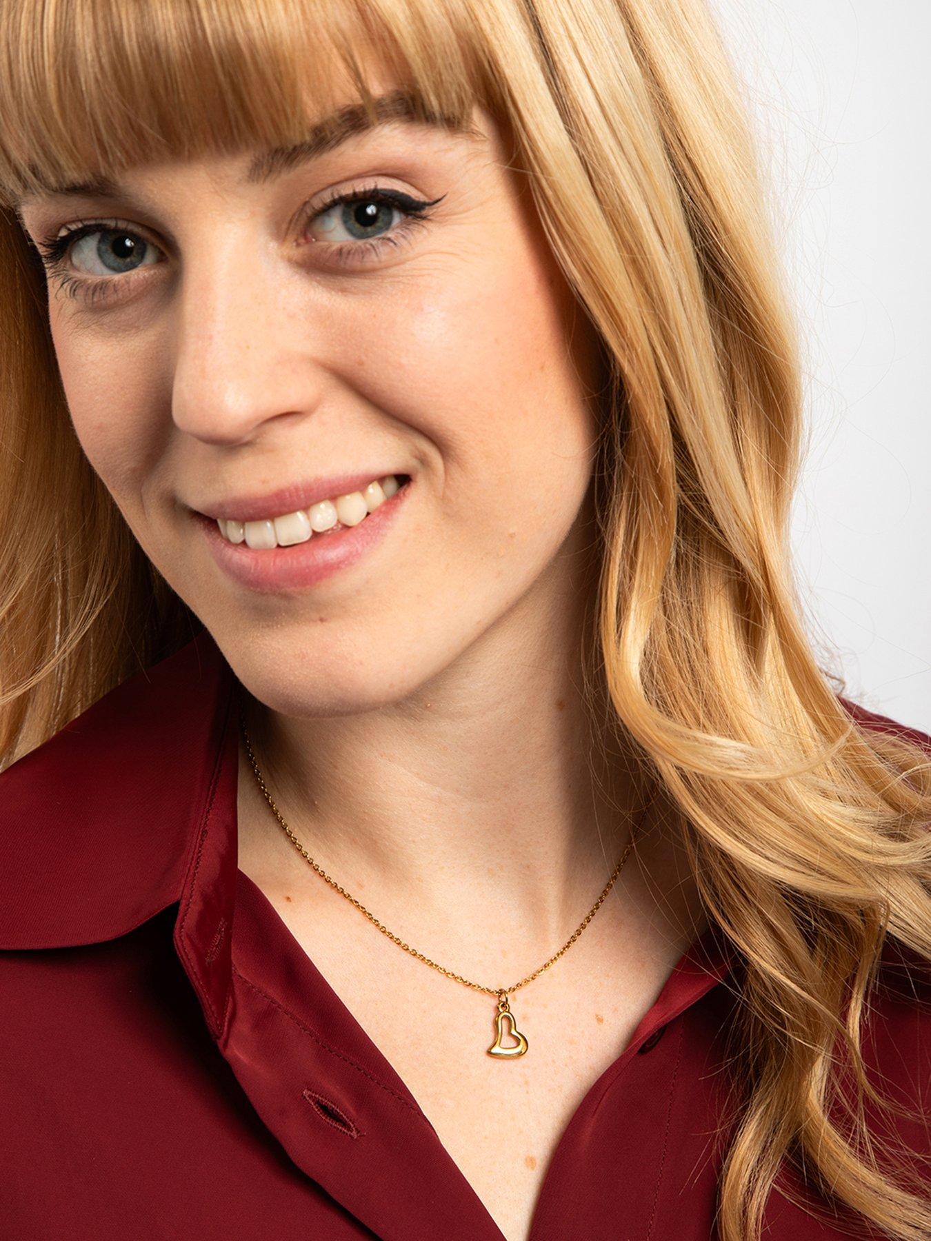 stillFront image of the-love-collection-gold-plated-stainless-steel-curved-heart-pendant-necklace