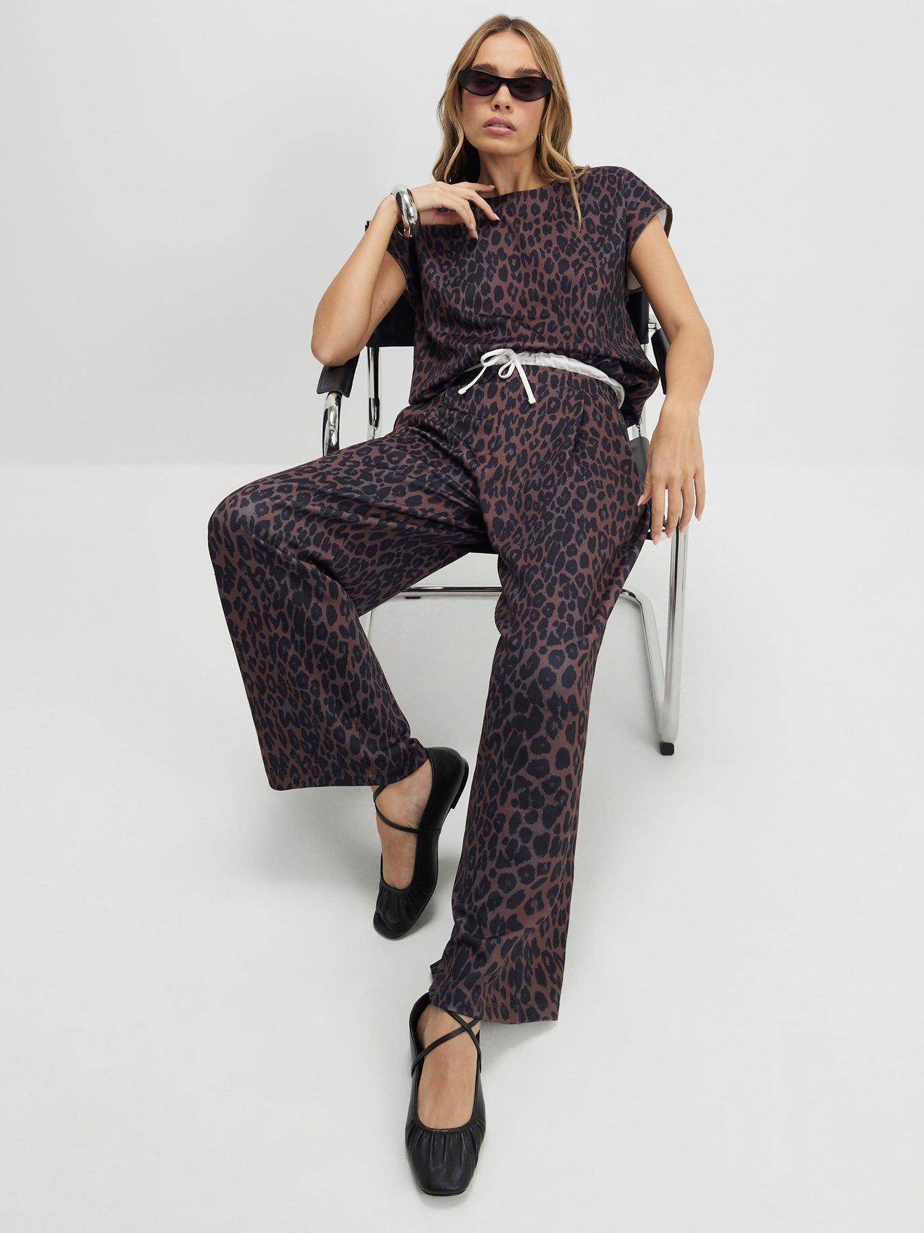Image 1 of 4 of River Island Leopard Print Wide Leg Trousers - Black