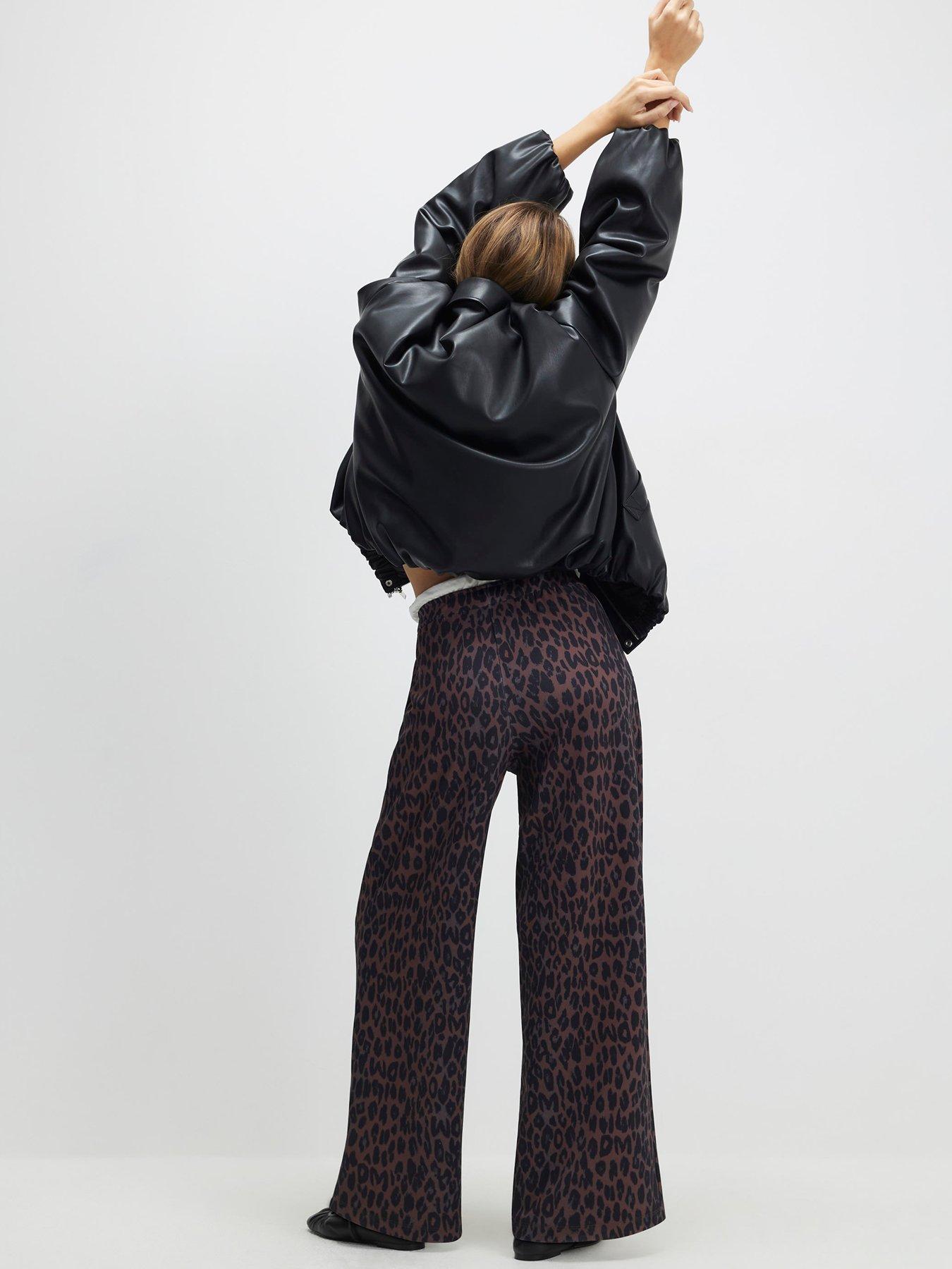 Image 2 of 4 of River Island Leopard Print Wide Leg Trousers - Black
