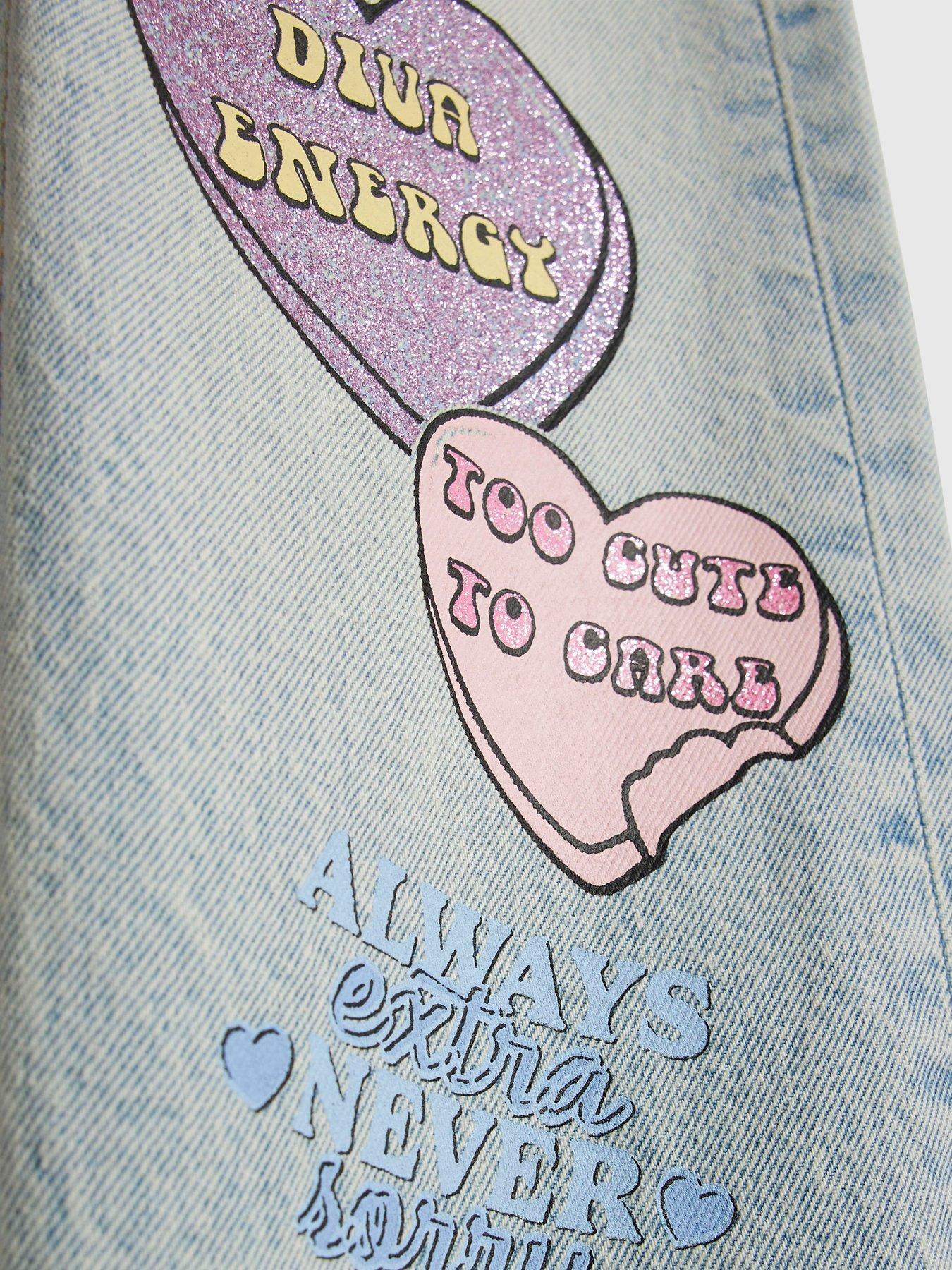 Image 4 of 4 of River Island Older Girls Love Heart Graffiti Straight Jeans - Blue