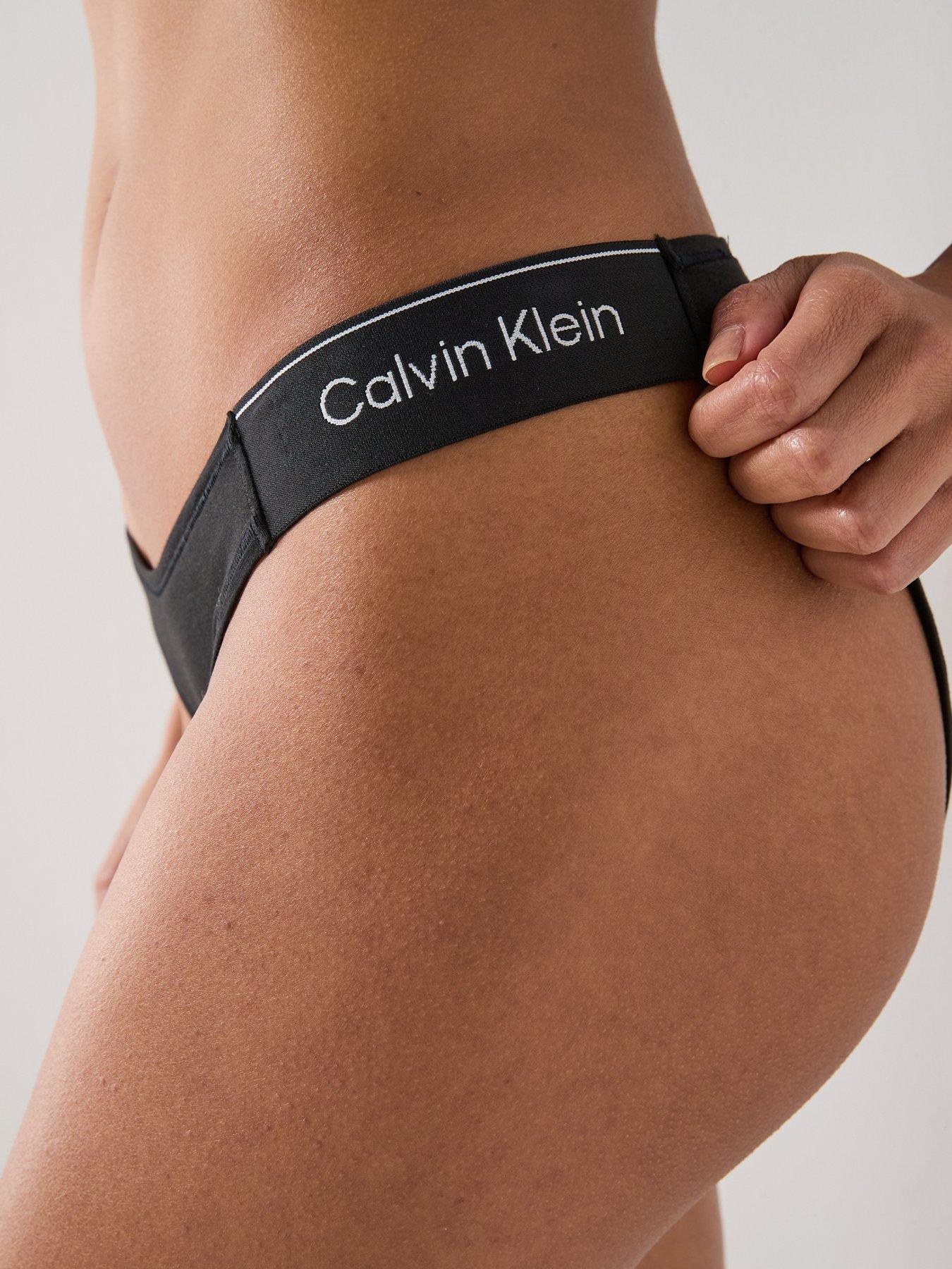 Image 4 of 5 of Calvin Klein String Bikini Bottoms - Black