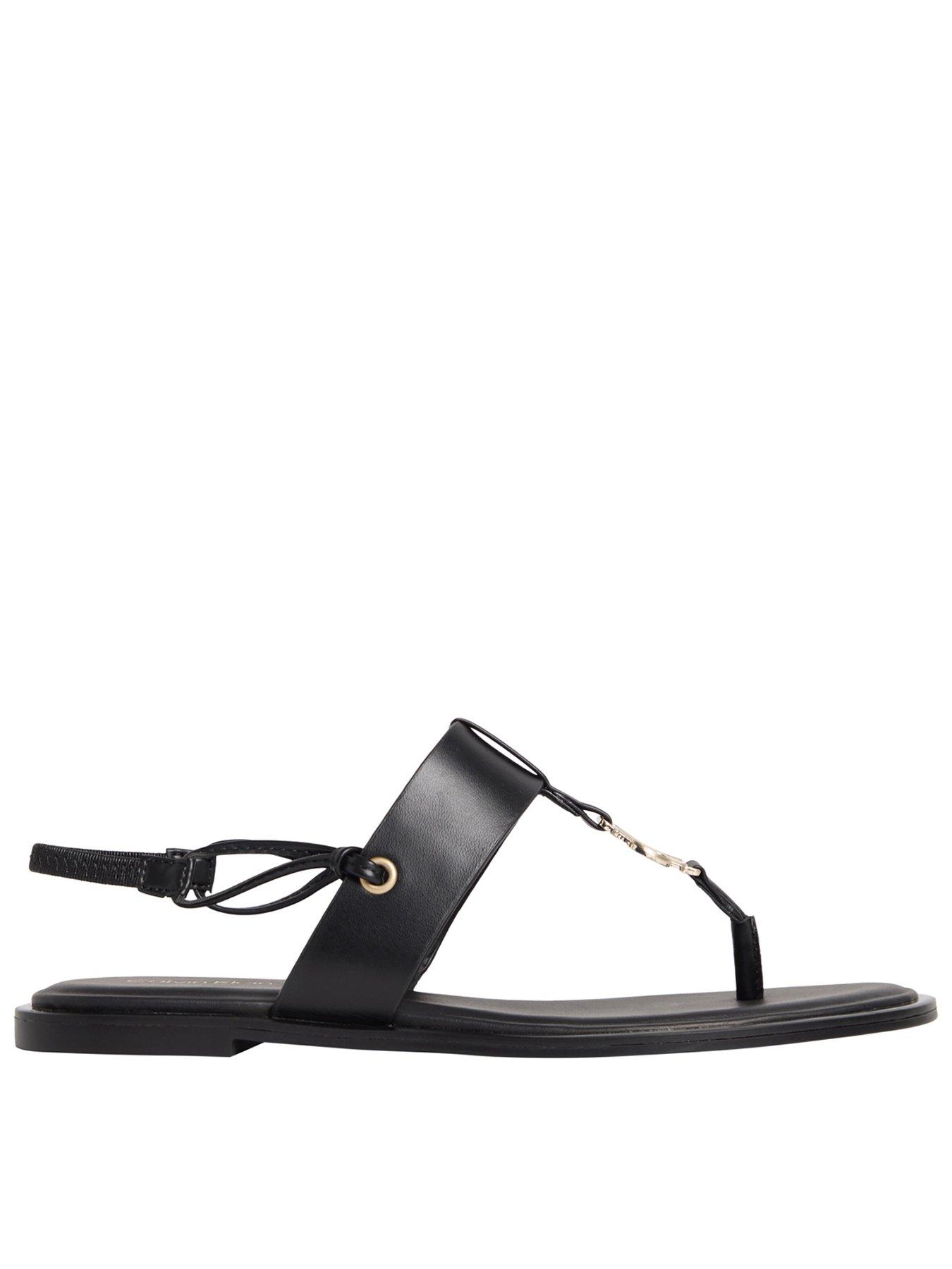 Image 1 of 3 of Calvin Klein Round Flat Thong Sandal