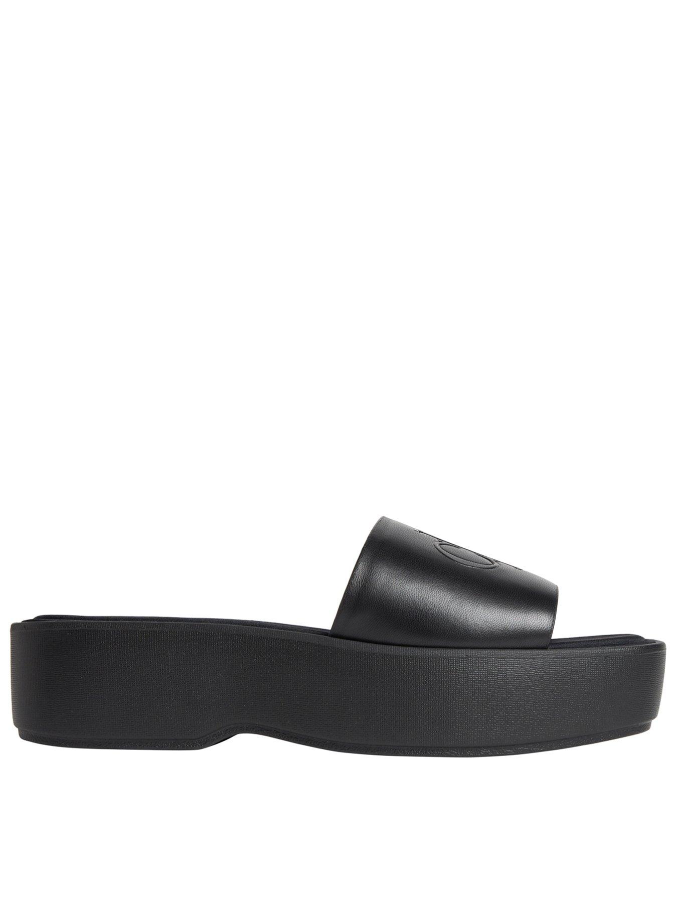  image of calvin-klein-flat-sandals-with-monogram-black