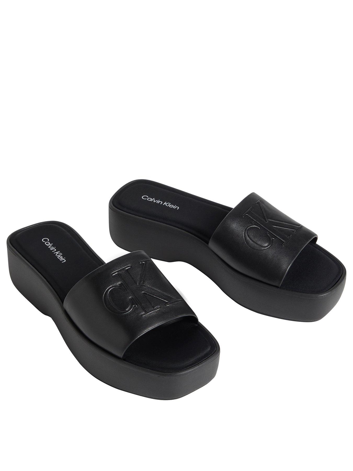  image of calvin-klein-flat-sandals-with-monogram-black
