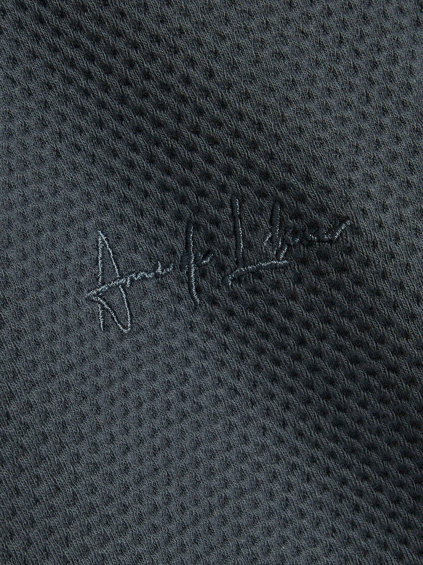 Image 6 of 6 of River Island Slim Bubble Interlock Short Sleeve T-Shirt - Grey