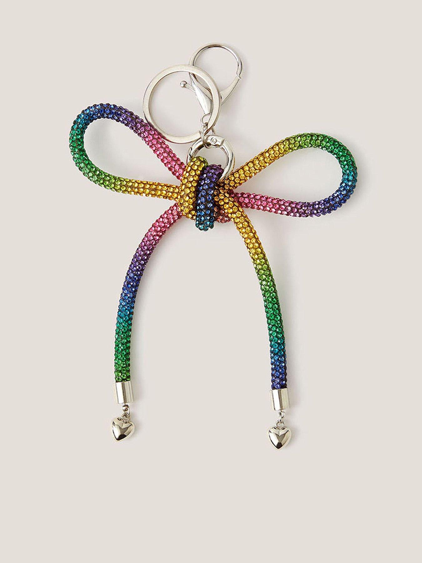 front image of monsoon-girls-rainbow-dazzle-bow-bag-charm-multi