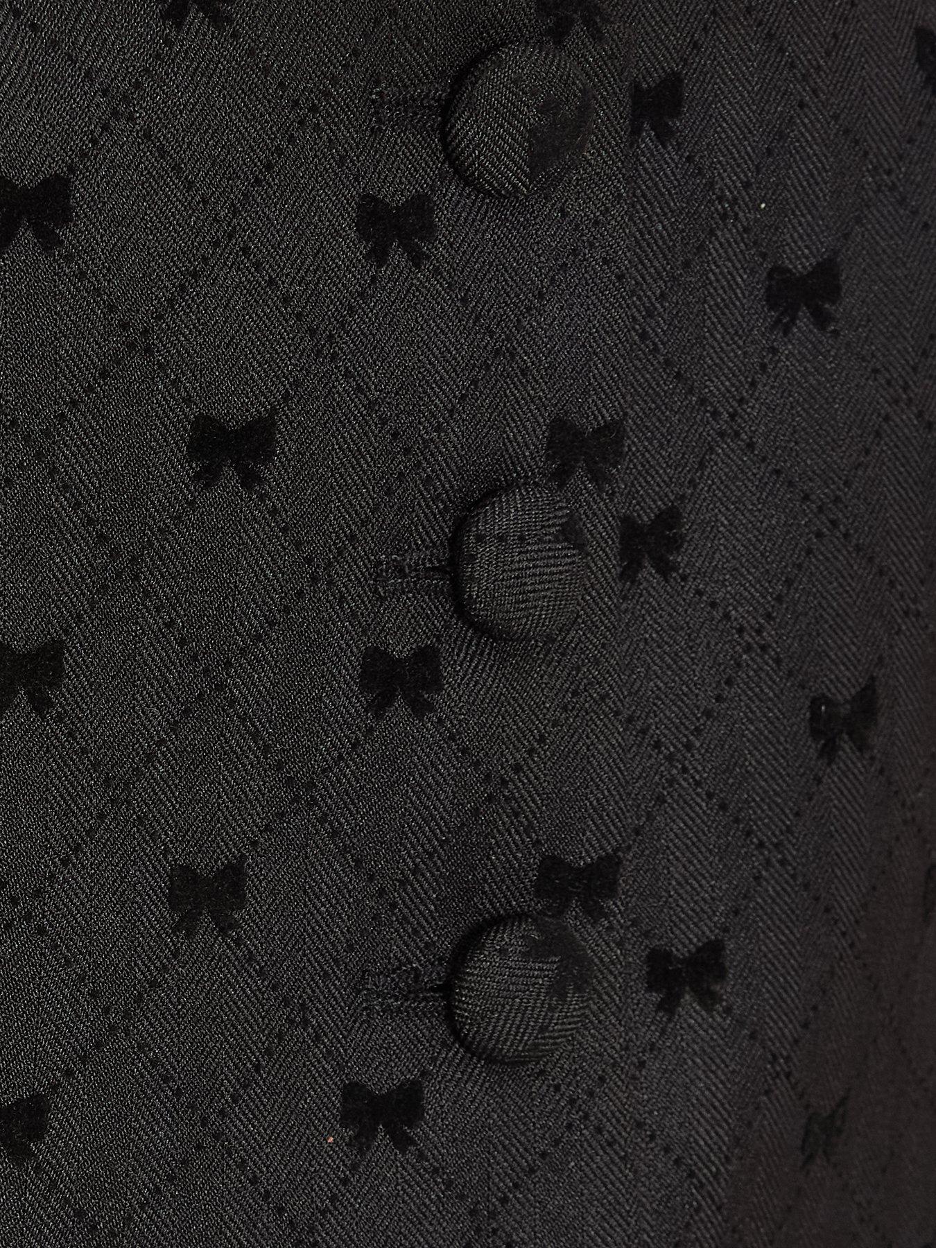  image of quiz-black-woven-bow-detail-waistcoat