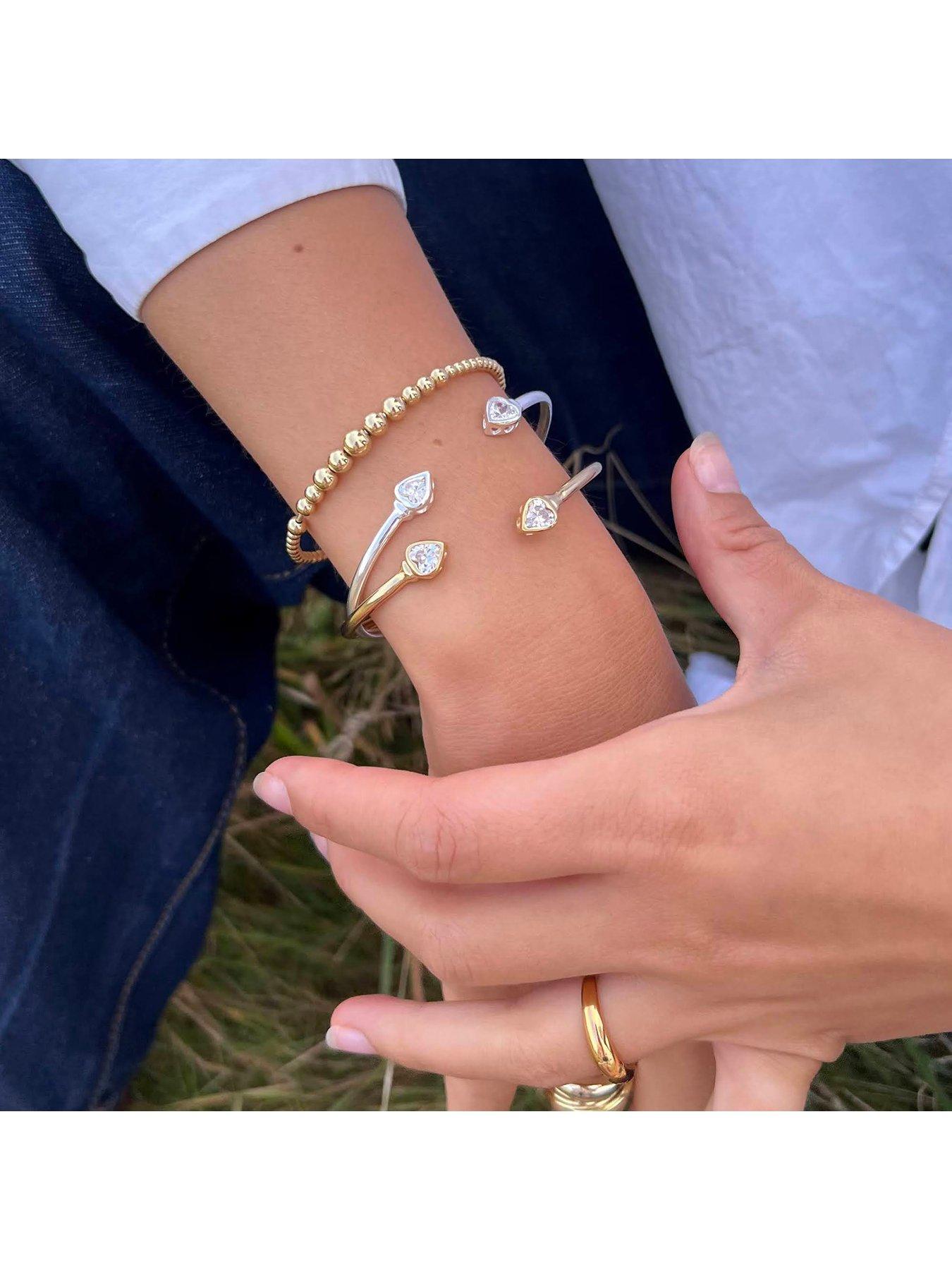  image of seol-gold-sterling-silver-heart-cz-torque-bangle