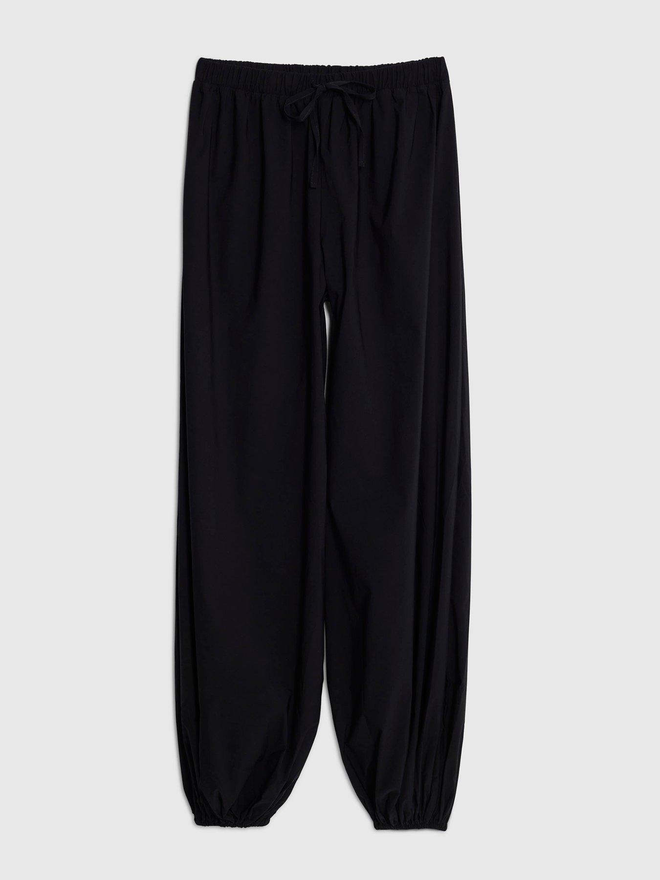Image 5 of 6 of River Island Technical Balloon Trousers - Black