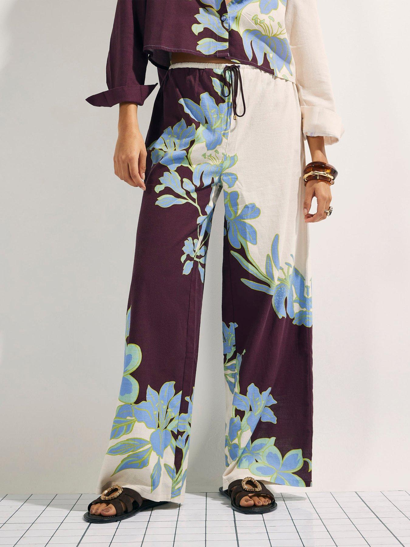 Image 1 of 4 of River Island Tropical Border Beach Trousers - &nbsp;Cream