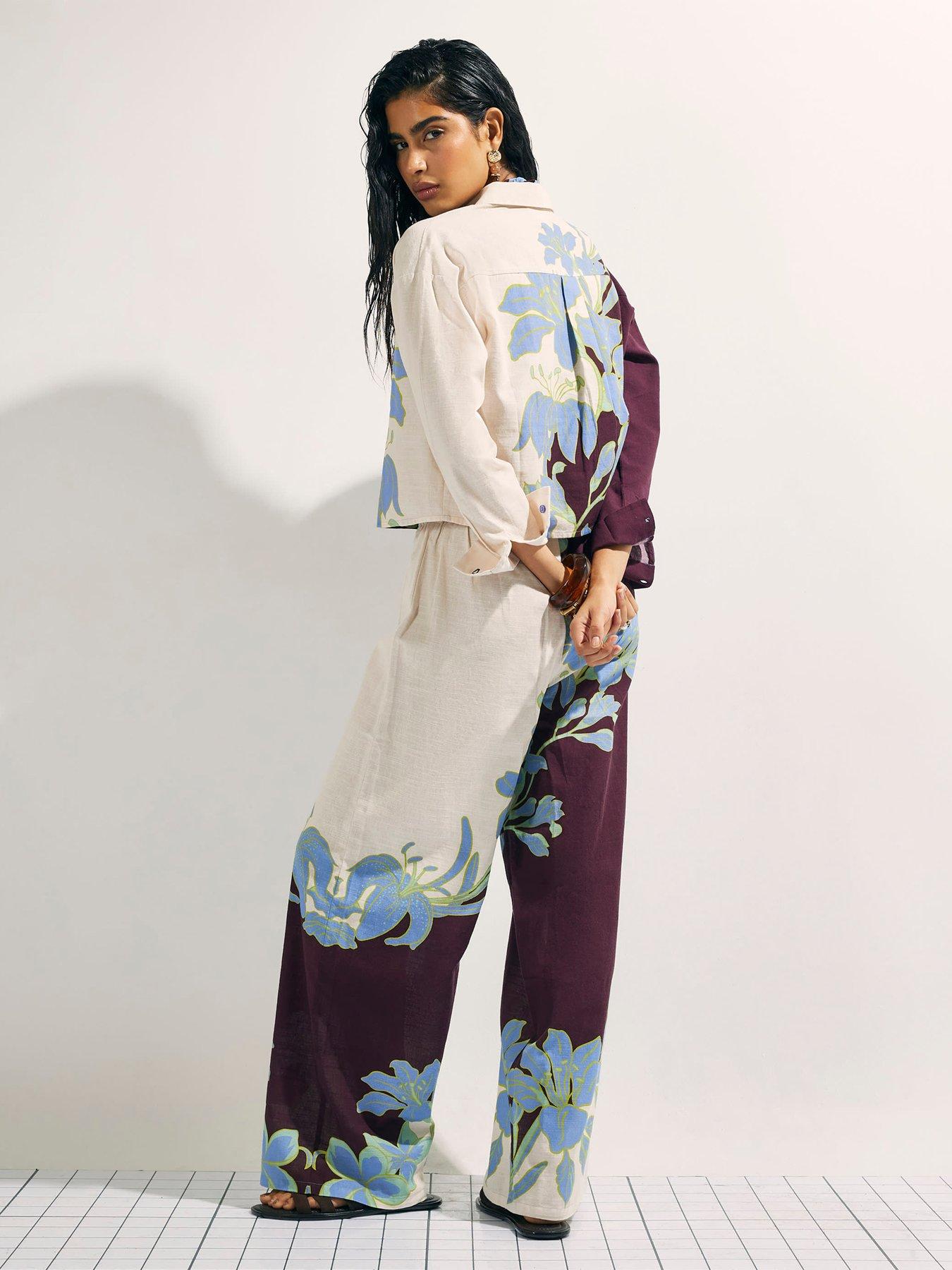 Image 2 of 4 of River Island Tropical Border Beach Trousers - &nbsp;Cream