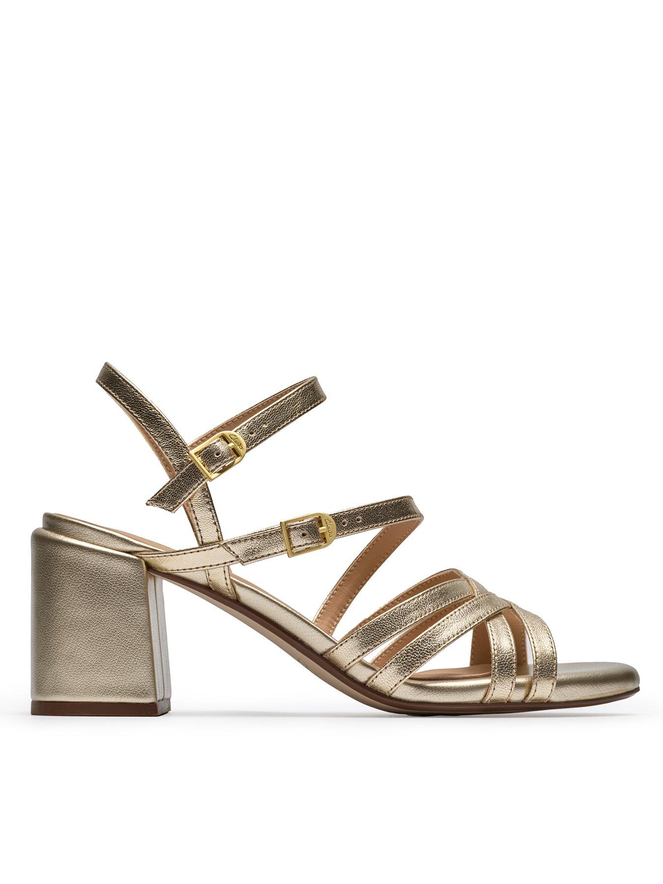 front image of clarks-ezoria-strap-sandals-gold-leather