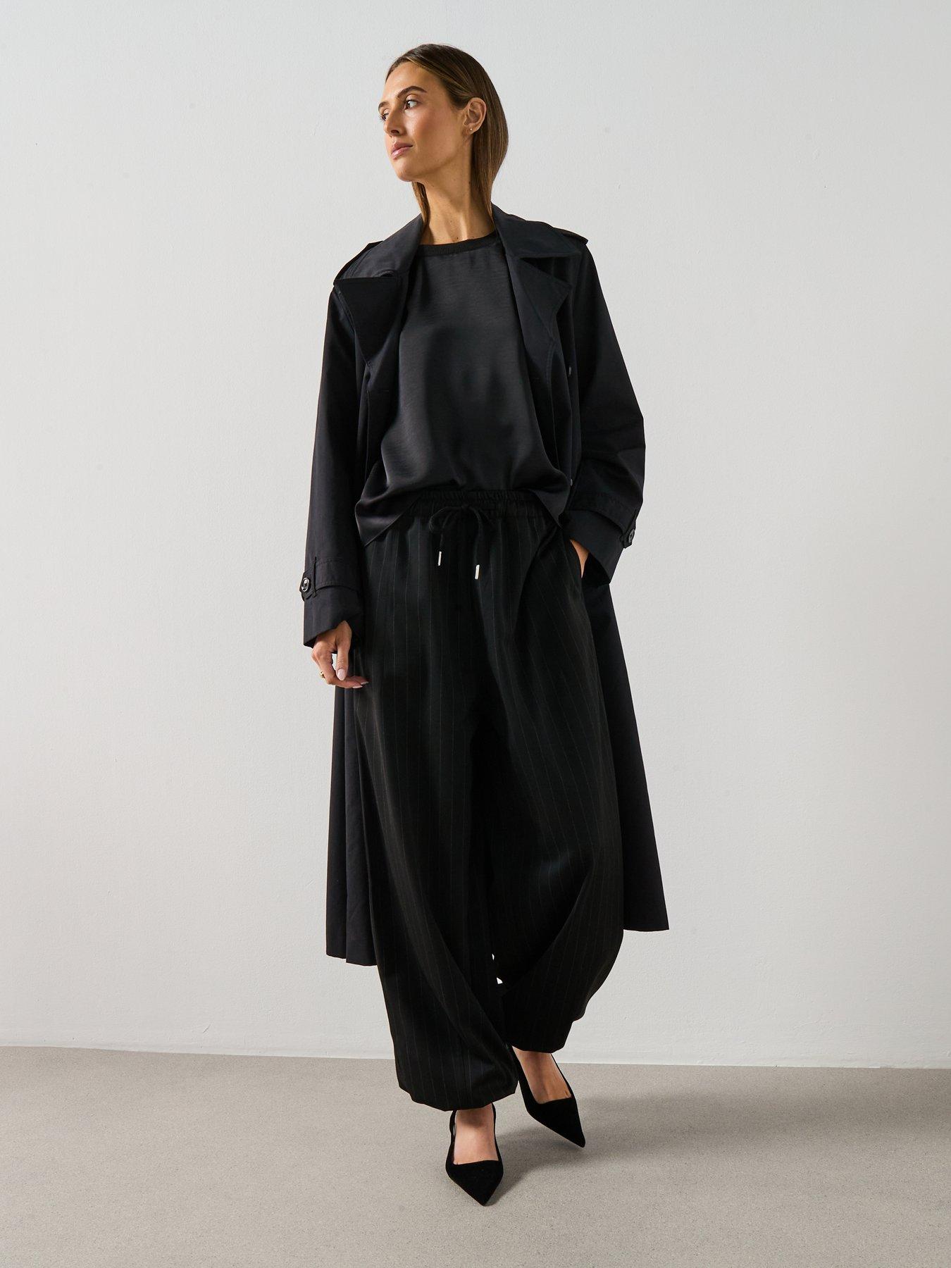  image of mango-pinstripe-balloon-trousers--black